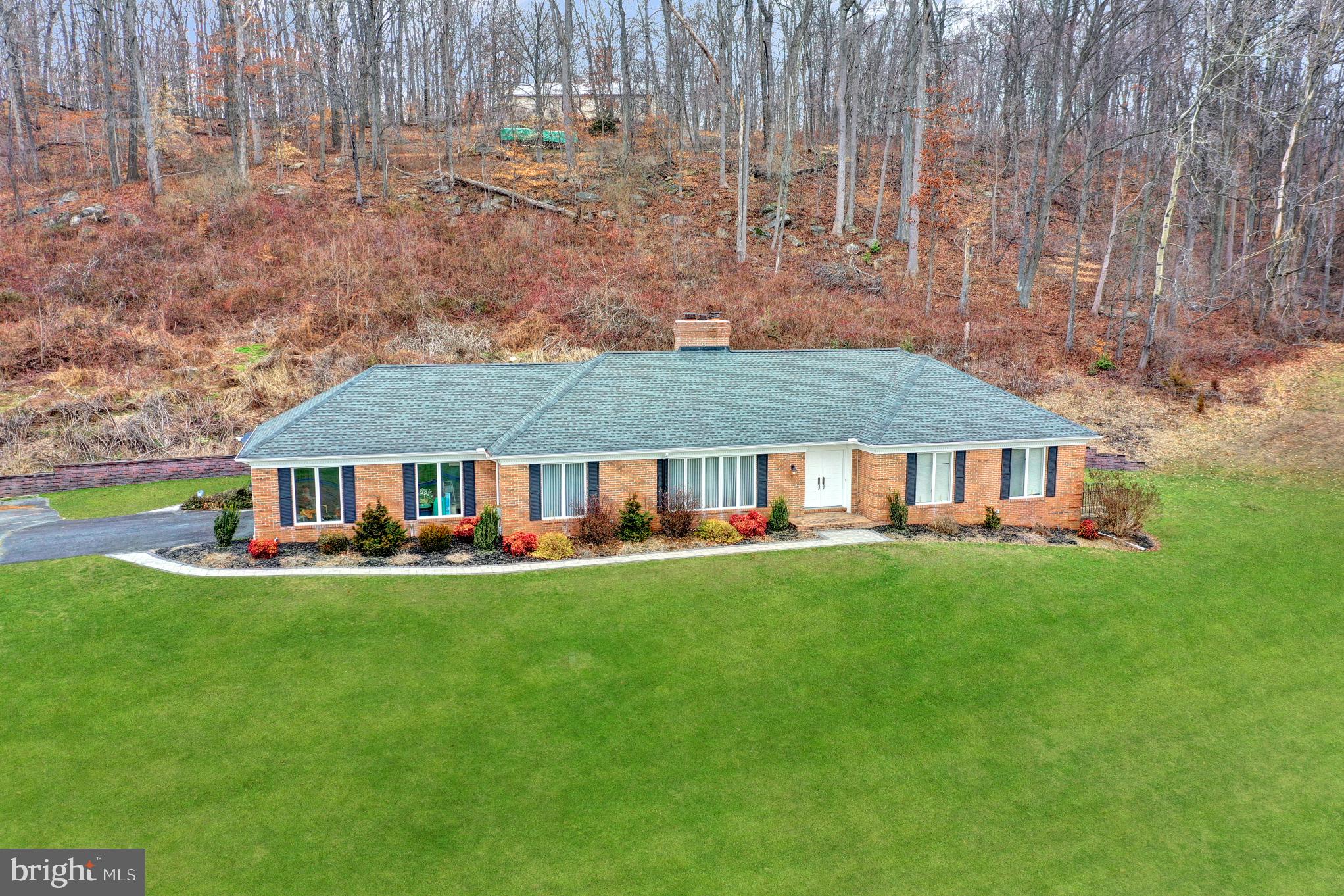 MULTIPLE OFFERS - SUBMIT ALL OFFERS BY 5 PM SUNDAY 2/4/24. Estate Sale! Lovingly maintained home on 17+ acres in the northern Harford County countryside.   Enter through the double doors to the foyer, sunken formal living room with brick hearth  fireplace, dining room, and kitchen with cherry cabinets and granite counters.  The kitchen opens to the family room featuring a brick hearth surround fireplace with wood stove insert.  All firewood on the property is included in the purchase! Relax in the Kohler walk-in jetted tub in the hall bathroom.  Access the rear  patio with roll-out awning through the French doors from the family room .   Private access to the rear patio from the Master Bedroom. The full unfinished basement is an option for additional living area with ample ceiling height and exterior stairs to the rear yard. There is a paved driveway from Grier Nursery Farms Court to the house and all the way up the hill to the 60' x 40' detached steel shop building. All of the home furnishings will be sold in a a series of Estate Sales. Watch this site for Open House/Estate Sale dates and additional photos of shop items to be sold.  See the detailed brochure in the MLS documents for more information.