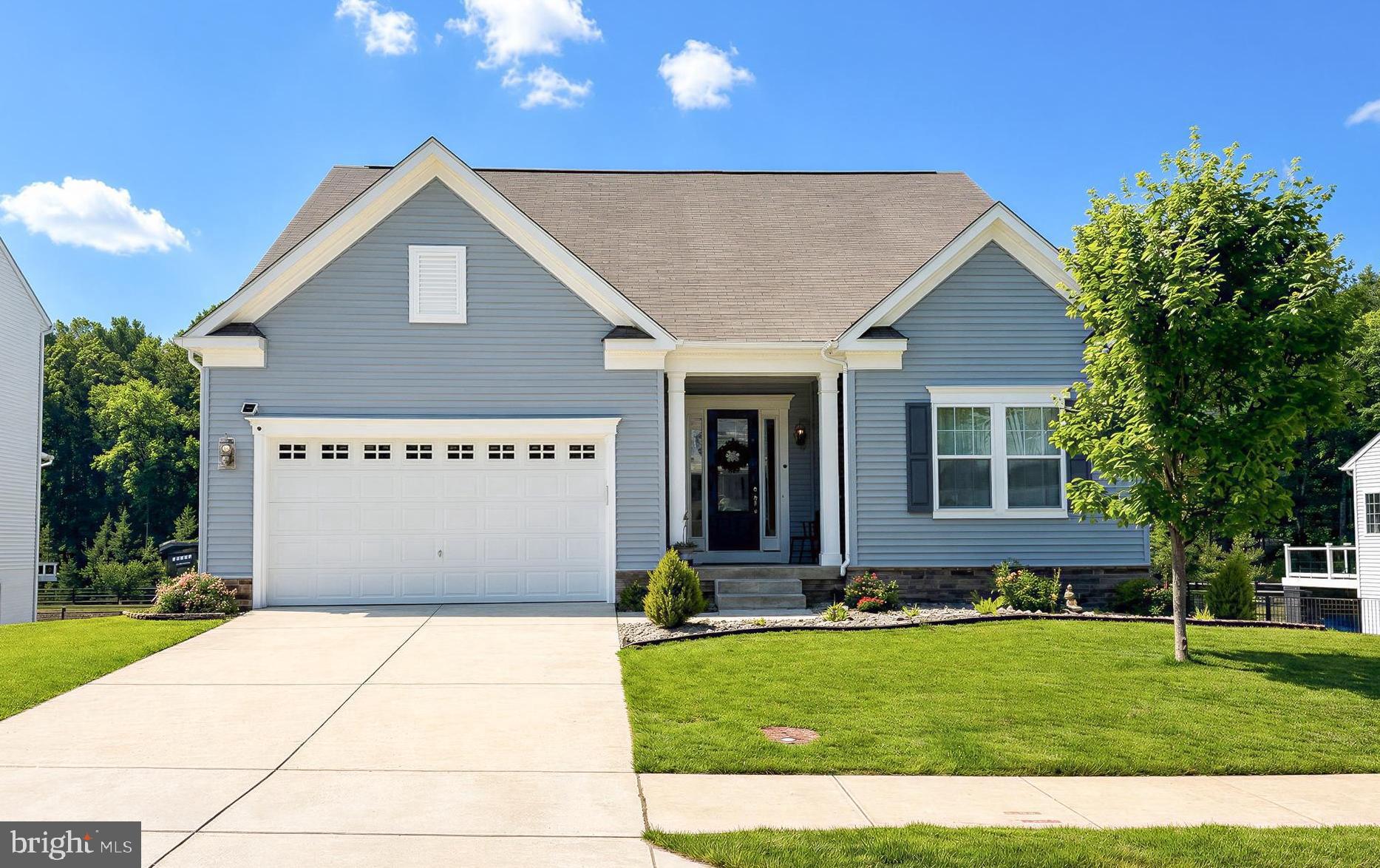 Gorgeous Leyland Park Rambler w/loft is move-in ready for you! Only 7 years young, this 3-bedroom, 3-bath home has been lovingly maintained, and comes with all the great Wildewood amenities! Enter the foyer and notice the raised ceilings throughout. Follow attractive, high-end wood laminate flooring through the main-level living areas. You'll pass a dedicated home office with French doors, on your way to a deluxe kitchen with luscious dark Maple cabinets, Quartz counters, stainless appliances w/ gas cooking, and big island that's great for prep work or gatherings. The open concept living room, dining room, and kitchen make entertaining a breeze. Let the party flow outside as the sliding glass doors open to a beautiful composite deck overlooking a pond. Sit and watch the turtles as you sip your morning coffee or dine al fresco on a pleasant evening. A gas fireplace warms the living room, and the dining room can seat eight with ease. Enjoy single level living with a main floor Primary bedroom with attached bath and walk-in closet. A second bedroom, full bath and laundry/mudroom complete the 1st floor. Both main floor baths include tile floors and showers. A second floor loft with full bath can be used for whatever you need. A third bedroom, guest space, playroom, hobbies, media room...  you name it! There's even more potential in the unfinished lower level. It has a bath rough in, and walk out sliders to a huge paver patio and the backyard. The backyard is fully-fenced, great for Fido or the kids. A roomy 2-car attached garage keeps cars warm and dry. This Stanley Martin neighborhood belongs to the community pool, clubhouse, tennis/pickleball, basketball, rec fields and more! Located just minutes from main commuter routes, shopping and restaurants, this home should be a must-see on your list. Request your showing today!