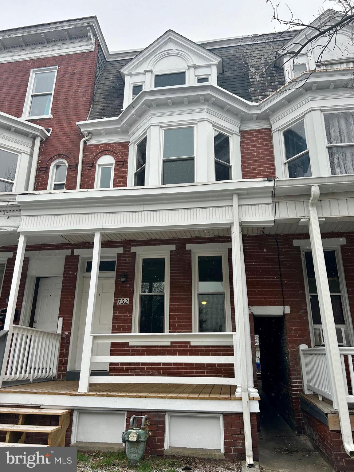 Completely remodeled 2.5 story home with new decking on the front porch.   Excellent condition. 1.5 baths. All new windows.  New vanities, toilets, flooring and  more. New stainless steel appliances.  Off street parking.