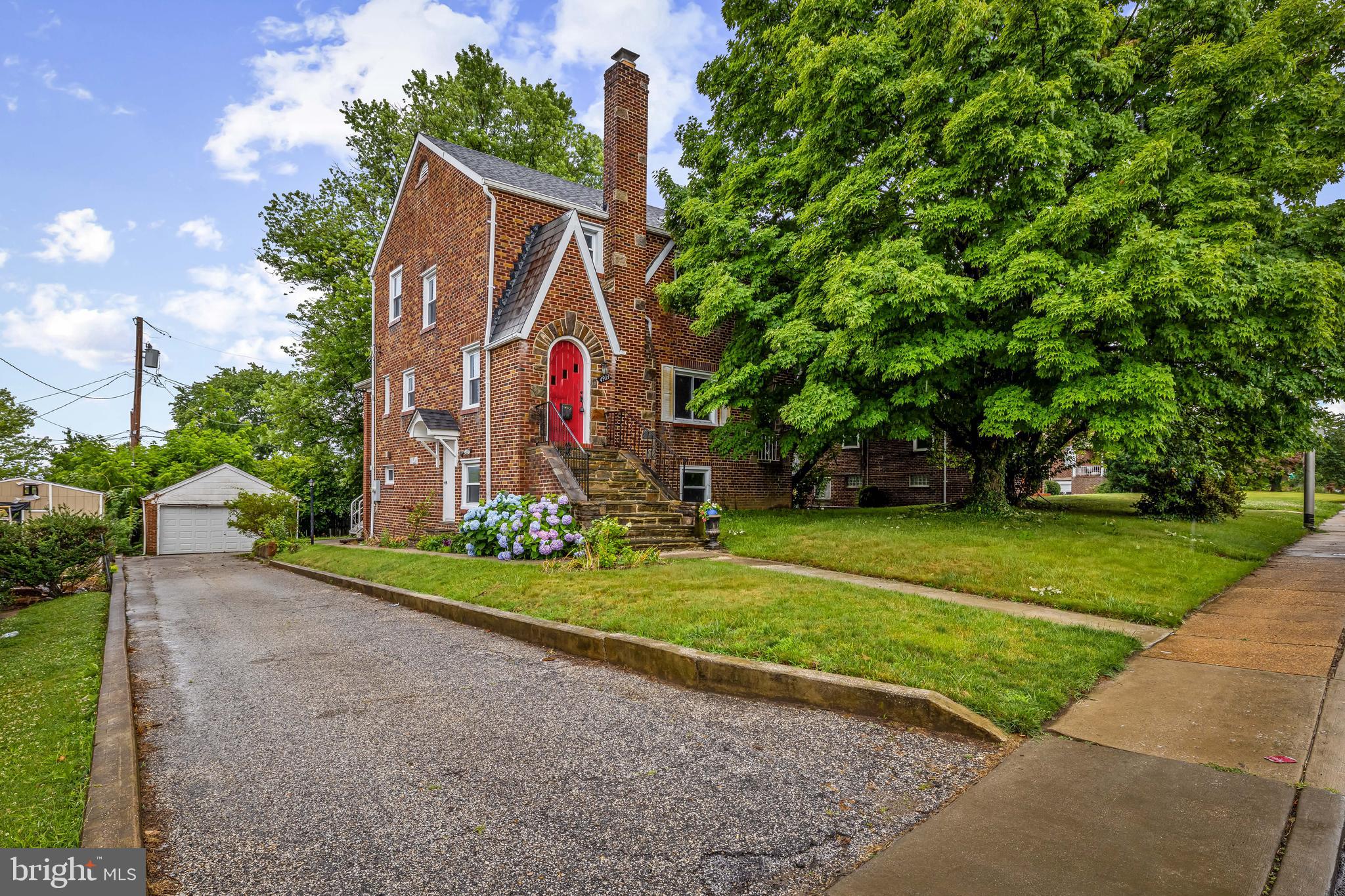 Old world charm meets modern updates!   The peaked roof above an arched entry door with stone surround  brings the old world charm to this brickTudor  home which was fully renovated in 2015.   Awash in natural light, the living and dining rooms offer inlaid wood floors, millwork,  a fireplace and access to rear and side porches which overlook spacious grounds,   The updated kitchen, featuring stainless steel appliances, will make everyday meal prep and enteraining a delight. Upstairs, you'll find 3 bedrooms and a hall bath.    The lower level provides the flexibiity buyers crave with a 2nd full bath, laundry, space for hanging out or guests and access to outside.    This large flat backyard is a blank slate - just waiting for a garden aficionado to make it shine! Easy walking distance to Walther Gardens , Zekes Coffee and all the other shops and restaurants that make nearby Harford Road such a  hot spot, 
Garage "as is"