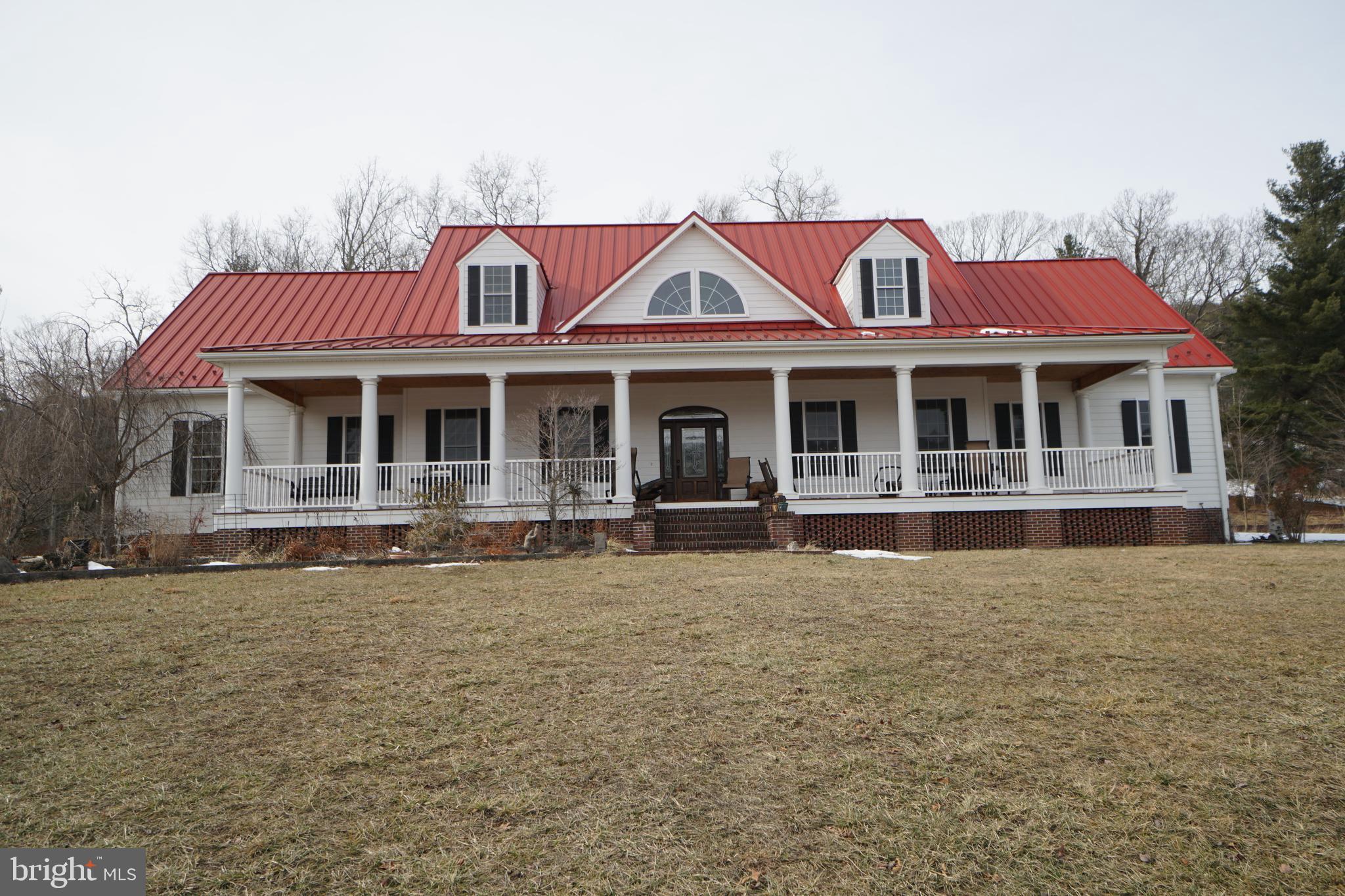 Magnificent, Well Built home with exceptional viewshed overlooking Fisher Mountain Golf Course and Shenandoah Mtn. Year Round Spring fed creek running to the left o f the property with several other springs and great building sites. Miles of mountain roads on property with excellent hunting. Road Frontage on US RT 33 and Troublesome Valley Road. Property adjoins the golf course real estate.