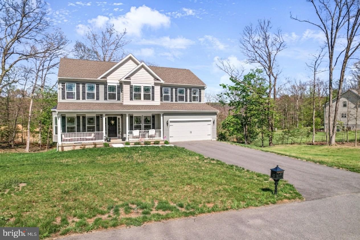 Welcome to Sun-Drenched Lakeview Vista! Set on a quiet no-thru street, this 2024-built home balances space, function, and a setting that actually feels like an escape. With nearly three-quarters of an acre, you’ve got room to breathe. 

Inside, the kitchen is the center of it all, with granite counters, stainless appliances, a large island, and enough space to gather in the breakfast nook and spread out without feeling crowded. It flows easily into the main living area, where a propane fireplace adds just the right amount of comfort. There is also a separate dining space and office when you want them, but nothing about this home feels overly formal.

Upstairs, you’ll find three generously sized bedrooms, multiple walk-in closets, plus the kind of laundry room location that actually makes day-to-day life easier. The primary suite is private, spacious, and functional, with a clean, well-finished bath. At the top of the stairs, peep the stunning water view from the additional sitting room windows. 
Out front, the full-length porch is a standout feature. It’s the kind of space you’ll use for morning coffee, evening wind-down, everything in between. And with the setting this home has, it’s worth slowing down for.

The Lakewood community adds even more to it, with access to a community beach, pavilion, and basketball courts. The amenities extend how you live here without overcomplicating it.

This isn’t a home that relies on hype. It’s well-placed and easy to settle into—which is exactly what most people are looking for.