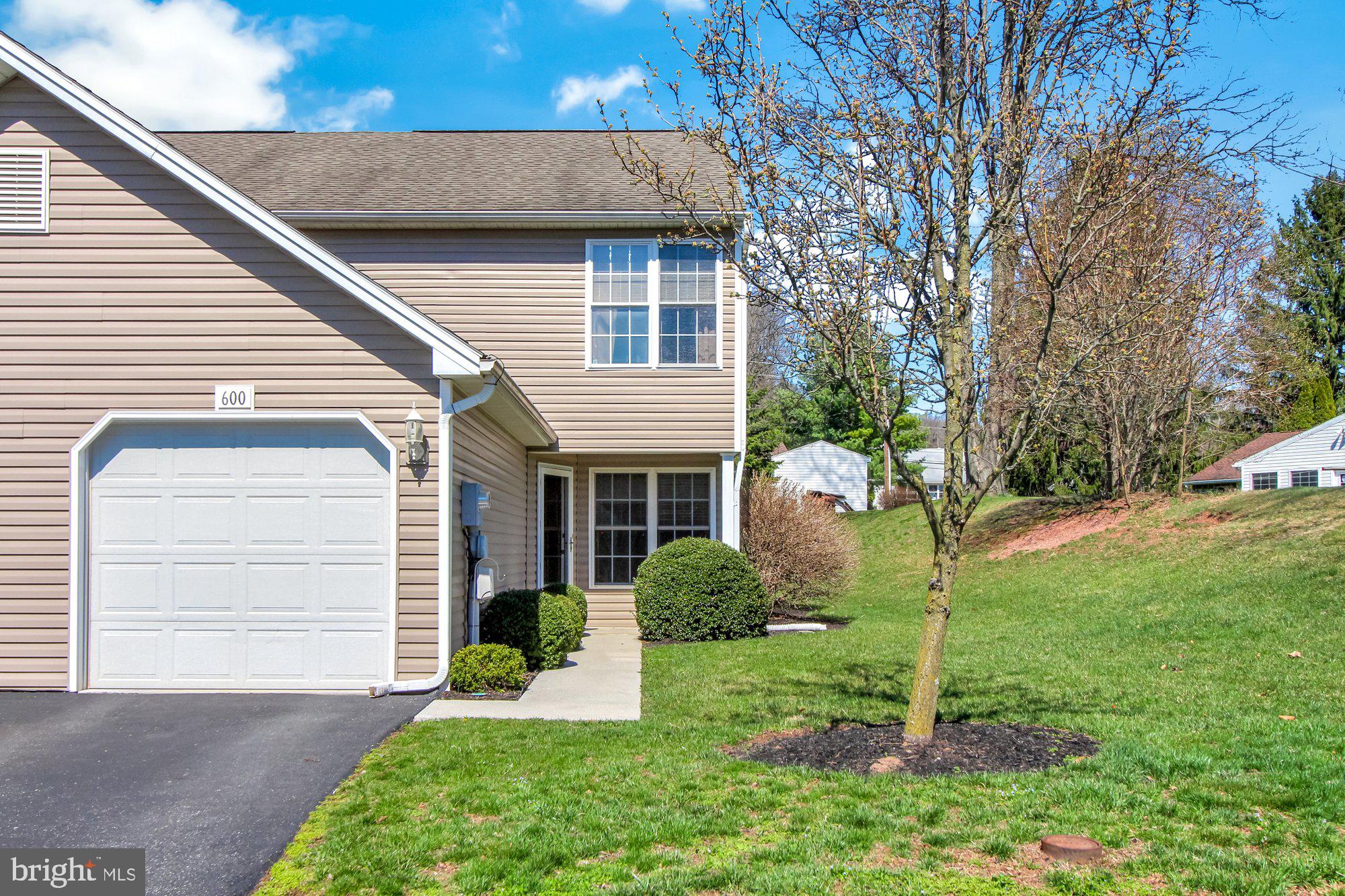 Affordable, maintenance free living awaits in this 2 BR, 2-1/2 Bath end unit condo.   You will love the open concept first floor, with cozy gas fireplace in the living room, bright kitchen and dining area with slider to the patio, and convenient half bath.  The kitchen offers tons of cabinet and counter space and a handy pantry as well.  Upstairs you will find 2 huge bedrooms, each with its own full bath and ample closet space, as well as a 2nd floor laundry, including washer and dryer.  Nice attached 1 car garage has electric door opener, and pull down stairs to access the storage area above.  As an added bonus, this home sits at the end of the street, giving you more privacy and less traffic.  New HVAC and water heater installed in 2020, and the condo association takes care of the exterior maintenance, so all you have to do is move in and enjoy!