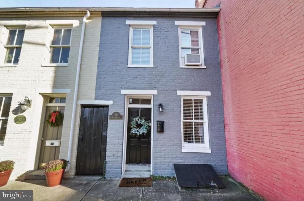 Step into the charm of historic downtown Frederick with this beautifully updated 1860s row house! Just steps from Carroll Creek, top-rated restaurants, breweries, and boutique shopping, this home offers the perfect blend of character and modern convenience. Featuring a fully equipped kitchen, inviting living spaces, and two cozy bedrooms, it's designed for comfort and style. Enjoy a private back patio and pet-friendly accommodations. With easy access to hiking trails, wineries, and historic landmarks, this home is an unbeatable opportunity for those looking to experience the best of Frederick! This property has been successfully operated as an Airbnb with revenue of $44K last year!  Call for more details!