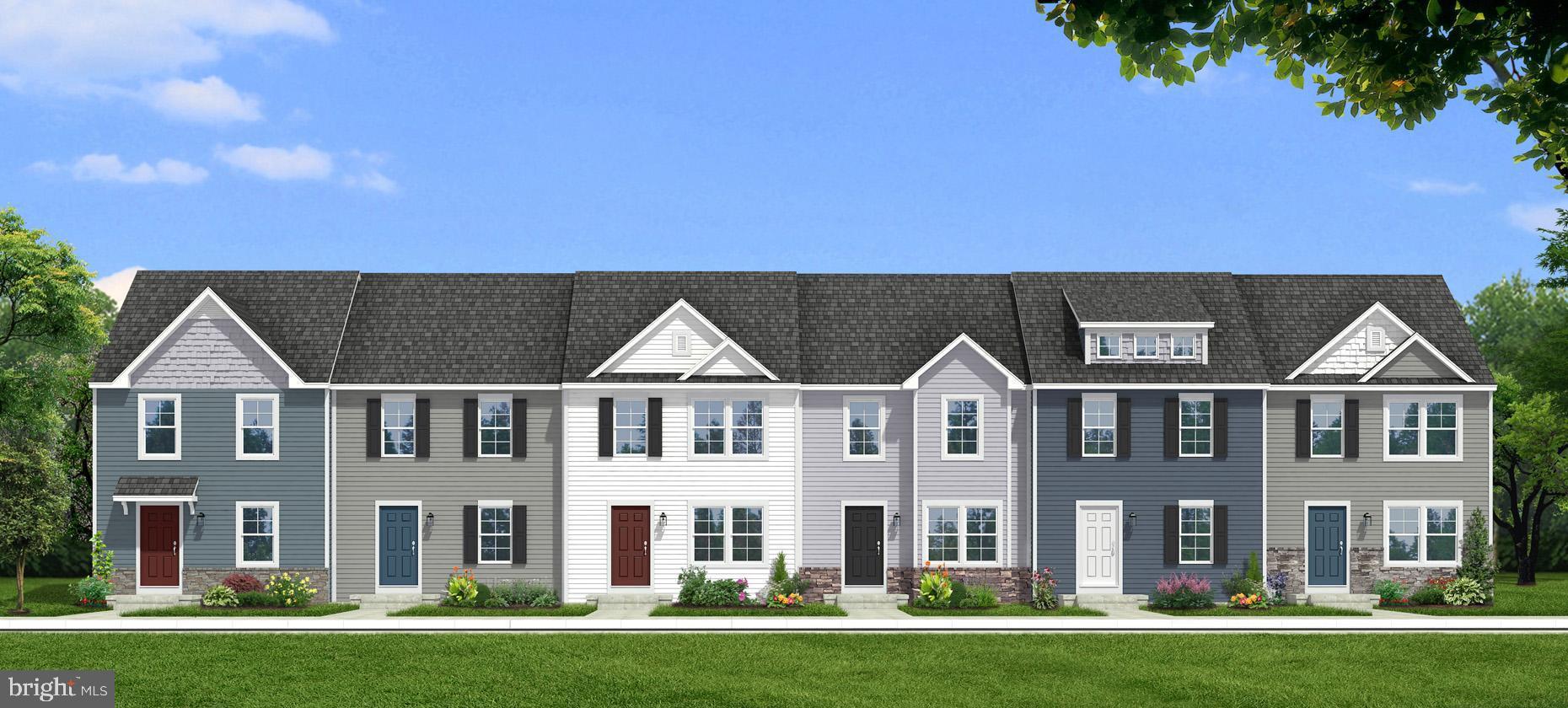 **OFFERING UP TO $15K IN CLOSING COST ASSISTANCE on contracts ratified by 3/31/26!* FOR PRIMARY RESIDENCE WITH USE OF APPROVED LENDER AND TITLE!** Step into this inviting end unit 2-level townhome featuring 3 bedrooms, 2.5 bathrooms, and a spacious, thoughtfully designed layout. The main level offers an open-concept living area filled with natural light, a modern kitchen with white cabinets, quartz countertops, stainless steel appliances, and a large center island, plus a cozy dining area that opens directly to the backyard. A convenient half bath and additional storage space complete the first floor. Upstairs, you’ll find all three bedrooms, including a generous primary suite with a walk-in closet and private ensuite bathroom. Two additional bedrooms share a full bath and offer plenty of space for family, guests, or a home office. Outside, enjoy a covered front entry and the bonus of an oversized paved driveway that fits up to 4 vehicles. This home has one of our most leveled back yards yet! *Photos may not be of actual home. Photos may be of similar home/floorplan if home is under construction or if this is a base price listing.