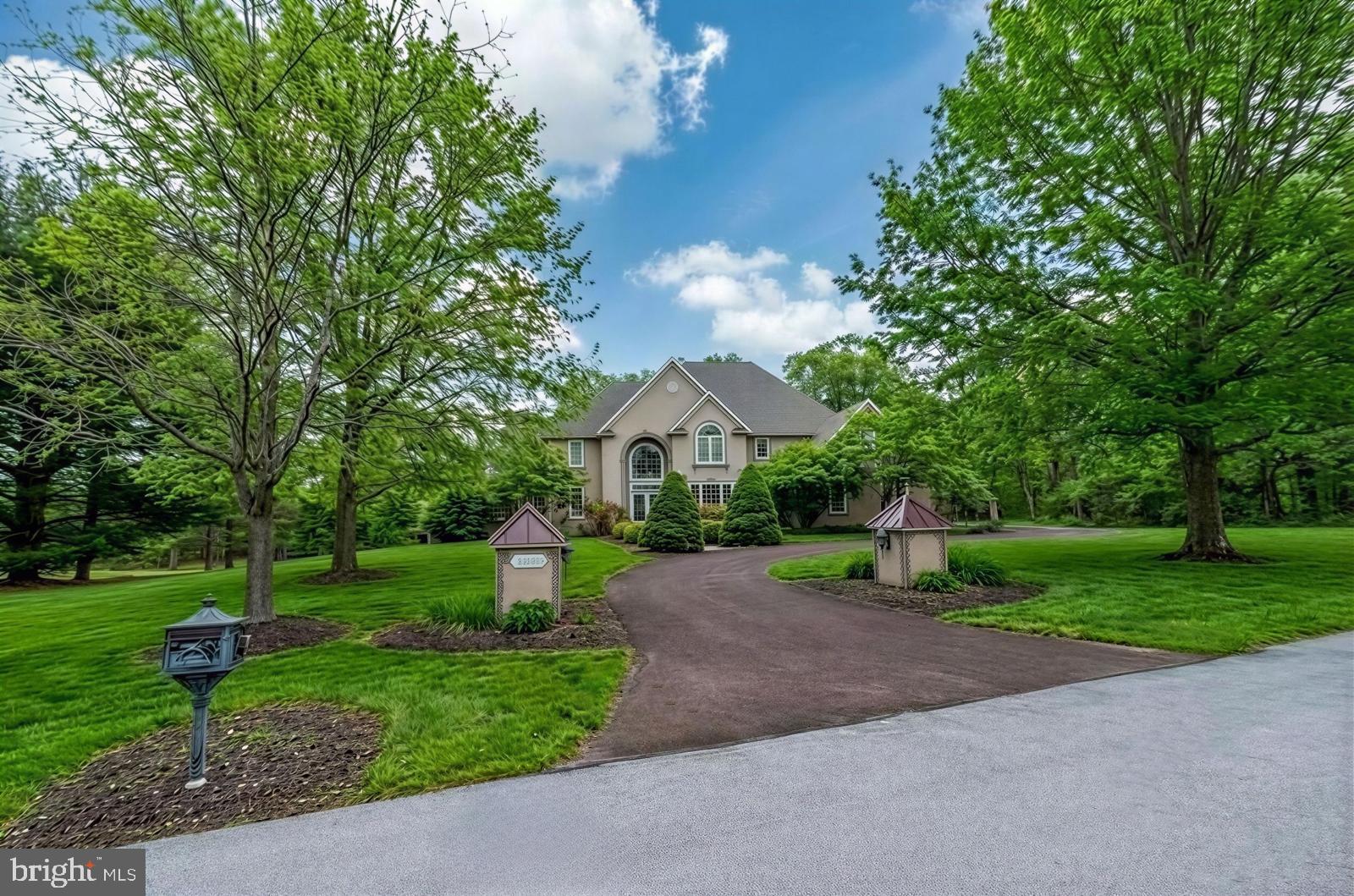 OPEN HOUSES CANCELED    HOME IS UNDER CONTRACT !!!  Tucked on a cul de sac in Fawn Creek walk to Heebner Park, this Zaveta-built French country manor offers space, craftsmanship, and a setting that is hard to match. From the moment you step inside, the home makes an impression with a dramatic two-story foyer, custom archways, intricate moldings, oversized windows, and a truly unique rotunda that adds architectural character you rarely see. Nine-foot ceilings, warm wood floors, and thoughtful built-ins carry throughout the main level.
The great room opens to a large, well-designed kitchen with granite countertops, a peninsula island, breakfast area, and a buffet counter. Upstairs are four generously sized bedrooms and three full baths, including a spacious primary suite with a tray ceiling, sitting room, and a beautifully laid out bath featuring two vanities, soaking tub, and a private water closet. A full two-story attic offers excellent storage and future flexibility.
The finished walk-out basement leads directly to the pool area and includes a fifth bedroom, full bath, wet bar, and expansive recreation space. Outside, the backyard is a true highlight with a swimming pool, hot tub, and an impressive entertainment pavilion complete with a stone fireplace, TV, ice maker, and refrigerator. A spacious custom deck overlooks the pool, wooded rear yard, and peaceful stream, creating a private and relaxing setting. All of this comes with the added bonus of no homeowner association.