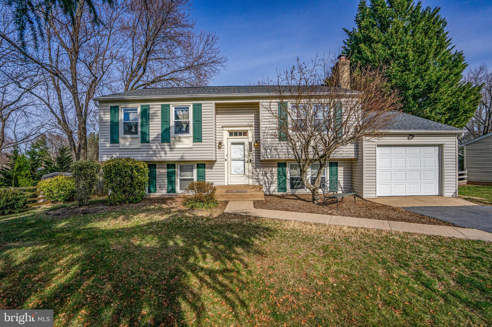 Welcome to this nicely maintained Four Bedroom, Two Full Bathroom with One Car Garage home in desirable Fox Mill Estates.  This home has some lovely updated and you will be happy you stopped by to check it out.  As soon as you enter this home it will win you over.  No Carpet anywhere in the home.  Starting on the upper level, you’ll see a nicely sized Living Room with plenty of natural lighting and recessed lighting.  The Kitchen is nearby and boasts many updated including Silestone Countertops, Hardwood Cabinets, newer Appliances, Large Breakfast Peninsula, Recessed Lighting, Stainless Undermount Sink with Spray Faucet and New Flooring.  The Dining Room area opens to Kitchen and has recessed lighting, decretive chandelier, new flooring and the Sliding Glass Door to the outdoor Deck & Patio.  There is a conveniently located Updated Hall Bathroom and Two large Bedrooms with adequate closet space and recessed lighting as well.  The lower level has a large Family Room with woodburning Fireplace (with wood stove insert), Recessed Lighting, Wainscoting, Beautiful LPV Flooring & the large Flat Screen TV (Conveys) .  There are two additional Bedrooms on this level with nicely sized closets and Recessed Lighting.  There is also a Full Bathroom with some very nice updates here too.  The utility room houses the stackable Full-Size Washer and Dryer.  Also, enjoy the spacious Deck and Patio with Fenced in backyard with Shed.  Some special features and updated of this home are a Spacious 1-car Garage, insulated and with heat & A/C.  No Thru Traffic!  This home sits on a cul-de-sac.  Updated are New Roof – 2024, New HVAC – 2018, Kitchen Flooring – 2025, Recessed Lights – 2025, USB Outlets in most Rooms, New Electrical Panel – 2025, Freshly Painted - 2025.  Community features include two playgrounds, low HOA fees, two community area pools (separate memberships), close to many restaurants and shopping areas, conveniently located near the Metro, Dulles Airport, and major commuter routes. Open House scheduled for Sunday April 6, 2025 from 1-4pm.