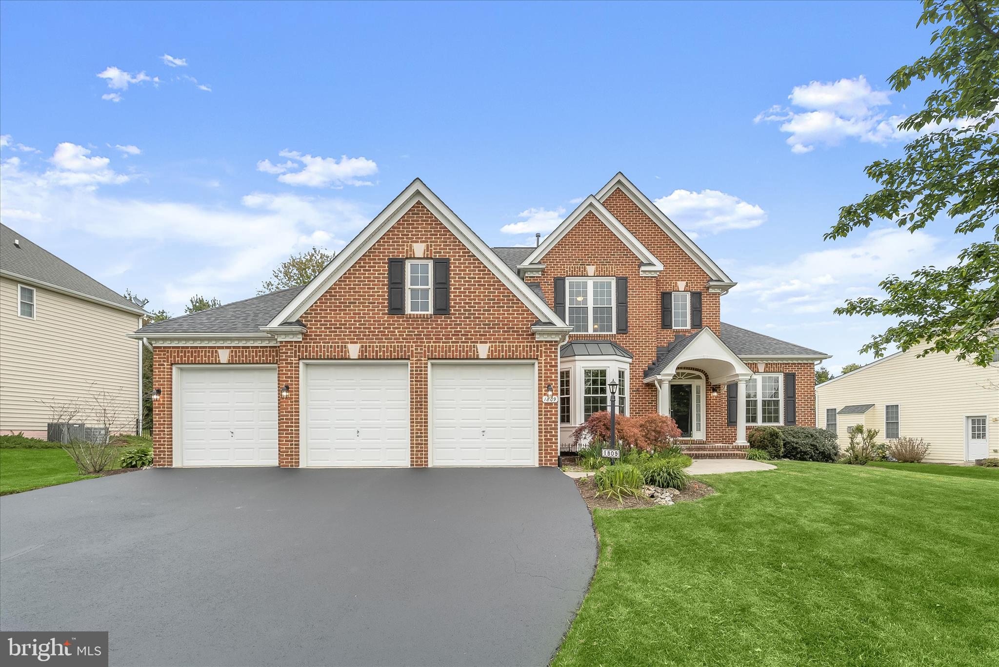 Elegant Colonial in the highly sought-after Nottingham community of Mount Airy, offering a refined blend of timeless design and modern updates. An exceptional floor plan showcases a dramatic two-story entry, stately columns, arched doorways, oversized windows, and the convenience of a main-level primary suite. The welcoming foyer is flanked by formal living and dining rooms adorned with classic moldings and rich hardwood flooring, creating an inviting setting for both everyday living and entertaining.
The eat-in kitchen is beautifully updated with quartz countertops, a center island with breakfast bar, ample cabinetry, and decorative backsplash, flowing seamlessly into a breakfast room highlighted by a double-sided fireplace and direct access to the patio and fenced backyard. A light-filled morning room, framed with windows overlooking the landscaped grounds, enhances the space, while the adjacent family room shares the warmth of the fireplace for comfortable gathering.
The main-level primary suite offers a private retreat with an en-suite bath featuring separate vanities, a soaking tub, glass-enclosed shower, and a walk-in closet. A spacious laundry room with garage access and a powder room complete the main level. Upstairs, three generously sized bedrooms and two renovated full baths provide ample space for family and guests.
The lower level expands the home’s versatility with a recreation room finished with luxury vinyl plank flooring, a bonus room, a full bath, and an unfinished area offering abundant storage. Additional highlights include a 3-car attached garage with EV charger, a patio, fenced backyard, and beautifully landscaped grounds.
Recent updates add even more value, including a new sink (2025), quartz countertops, backsplash, and refrigerator (2024), as well as a washer, dryer, and dishwasher (2023), making this home as functional as it is stylish.