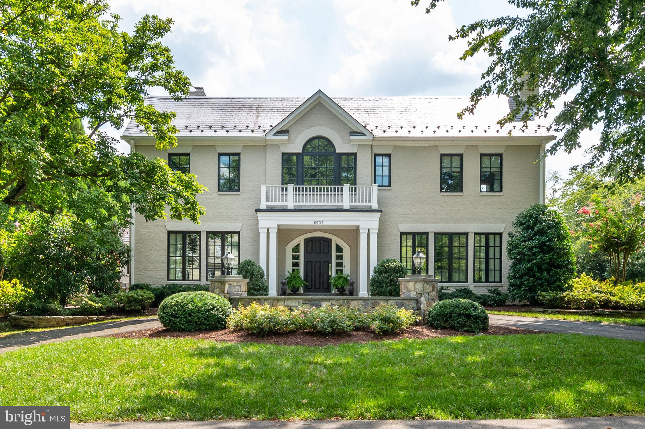 Prepare to be enchanted, this elegantly designed home with timeless architecture is located the heart of McLean’s prestigious Langley Farms. Meticulously updated with handsome custom appointments this bespoke home boasts approximately 7,500 sq. ft. of luxury living space. The light and airy Foyer opens to the formal Living and Dining Room that feature custom moldings and wainscoting. A sun-filled Kitchen with top-of-the-line appliances, custom cabinetry and huge island opens to the Breakfast Room and cozy Morning Room with a fireplace. The sumptuous Family Room has coffered ceilings, built-in shelves, stone fireplace and French doors. To complete the Main Level there is an Office/ Study, custom Mud Room and Powder Room. The Upper Level features the private Owner’s Suite complete with a lavish Bath, separate vanities and two custom walk-in Closets. The Upper Level also includes 4 Bedrooms, 3 Baths and the Laundry Room with tons of storage space. The 4th Level has a lovely Bedroom, Sitting Room and full Bath. A spacious Recreation Room in the Lower Level has wood floors, Wet Bar, Fitness Room and Full Bath. The Exterior features a circular Driveway, attached 2 car garage and detached 2 car garage, landscaped Patios with a gas fire pit for chilly nights.