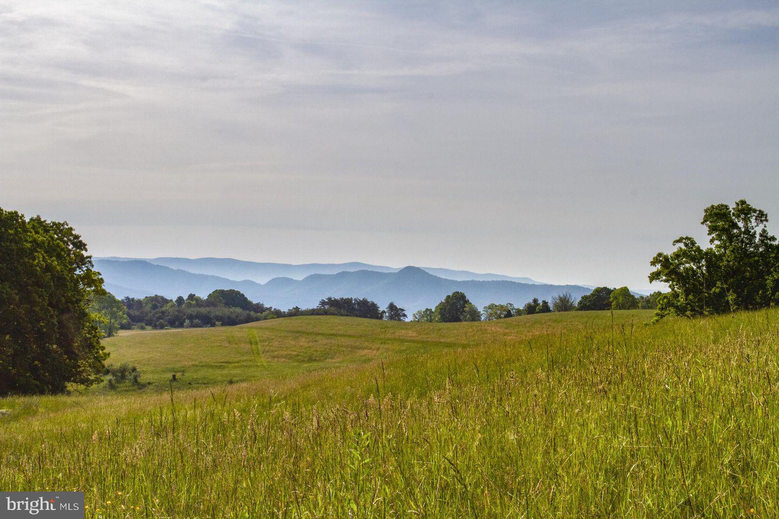 Nestled near Main Street Blacksburg, the municipal golf course and Virginia Tech, this magnificent 195+ acre parcel of land unfolds a picturesque panorama that seamlessly marries the tranquility of nature with the vibrancy of urban living. Majestic mountains embrace the horizon, providing a breathtaking backdrop that enriches the essence of this prime real estate. The land invites a proposed residential development that transcends ordinary living. Envisioned within this sprawling canvas is a harmonious fusion of multi-family and single-family dwellings, carefully curated into a tapestry of community living. Mountain views become an integral part of daily life, acting as silent companions to the residents, offering solace and inspiration, manifested in sprawling lawns, communal spaces, and walking trails that weave seamlessly into the natural topography.