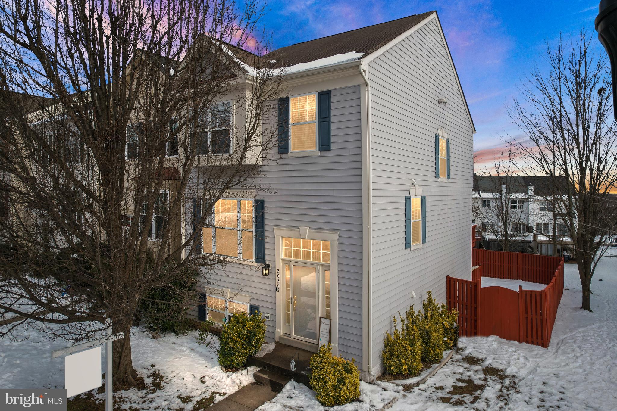 I mean, Shut.The.Front.Door!!! Or should I say:  Open the front door?!  🏡✨ Great, now that we got the awkwardnes out of the way:  Welcome to your dream home in Ashburn, VA! 

As soon as you pull up into this well kept secret of a subdivision, you'll appreciate the established landscape and the GENEROUS PARKING provided for this enclave of homes.  And yes, your future home is the first one to the right featuring a great elevation with an IMPRESSIVE BUMP OUT BAY WINDOW (as a hint of what awaits inside!).  This gorgeous end unit has 2 parking spots assigned and for those of you driving big cars and trucks, or simply don't like to feel crammed when you park, let me tell you, you won't.  Now, let's  walk in, but warning! as soon as you step in:  Boom! In your face! All this gorgeousness is so hard to contain!  First, let me brag about the LUXURY VINYL PLANK flooring that takes this home to the next level, I mean beauty and function, #score!

The openness and abundance of NATURAL LIGHT flooding the space is perfection!  The welcoming living and dining room are graciously connected and FLOW EASILY into your GOURMET KITCHEN, highlighted by a window above the sink, overlooking your beautiful and ample deck and the space beyond knitted with matured trees for maximum privacy!  The GAS RANGE is a must for the chef of the house, a very good size food pantry, and a great ISLAND for food prep make this gorgeous white kitchen shine, plus the understated black hardware to match appliances perfectly are just the cherry on top.   Seamlessly adjacent to the kitchen is a quaint BREAKFAST NOOK and a mega open SUNROOM with VAULTED CEILINGS that undoubtedly make this vibrant space the heart of this residence.  I can totally see you sipping your morning coffee with a view of nature right out of your windows!

Going upstairs to the upper level, the home features 2 windows at the stair well that let in a lot of natural light from where you can admire the most gorgeous SUNSETS!  The  very GENEREOUSLY-SIZED bedrooms ensure everyone has their own comfortable HAVEN.  To put that unwinding touch, the BATHROOMS ARE VERY SPACIOUS & designed to be a sanctuary to relax from the hustle and bustle of daily life.  One of my favorite features of this home is the sit-in bench with a picture window in one of the secondary bedrooms, it's the ULTIMATE READING NOOK. And since life responsiblities can be a nag lol, doing LAUNDRY JUST GOT A LITTLE BIT EASIER by having your state of the art appliances right in the bedroom level!  

The BASEMENT is ginormous!  Completely open! The possibilities are endless! Great option for a teen hangout area or a MAN CAVE.  It has a great long wall for a giant TV, room for a pool table, lounging, and more.  It has a legal (4th) bedroom and a FULL BATHROOM, also a cute little space for a bar and mini kitchenette.  As a bonus, there is a very large storage room with shelving to maximize the number of bins, luggage pieces, etc., that you want to keep out of sight ;)

Feel the tranquility as you step into the backyard – a private oasis backing to trees, providing the perfect retreat for relaxation and entertainment. Being an end unit, there's additional land to the side, offering even more space for outdoor enjoyment, vegetable gardens or any other potential landscaping dreams.

Location is everything, and this townhouse excels in that department. Situated right off Clairborne Pkwy and Gloucester Pkway, you're just minutes away from high-end shopping, retail therapy, and the renowned Inova Loudoun Hospital.  Also easy access to Dulles Airport, the metro, and more, making every commute or errand a breeze.

Your future home is not just a property; it's a lifestyle! Nestled in an AMENITY-FILLED community, you'll get to enjoy comfort, where every detail has been thoughtfully crafted for modern living. Don't miss the chance to turn this house into your dream home – book a tour right away and let the journey to your new life begin! 🏡🌟