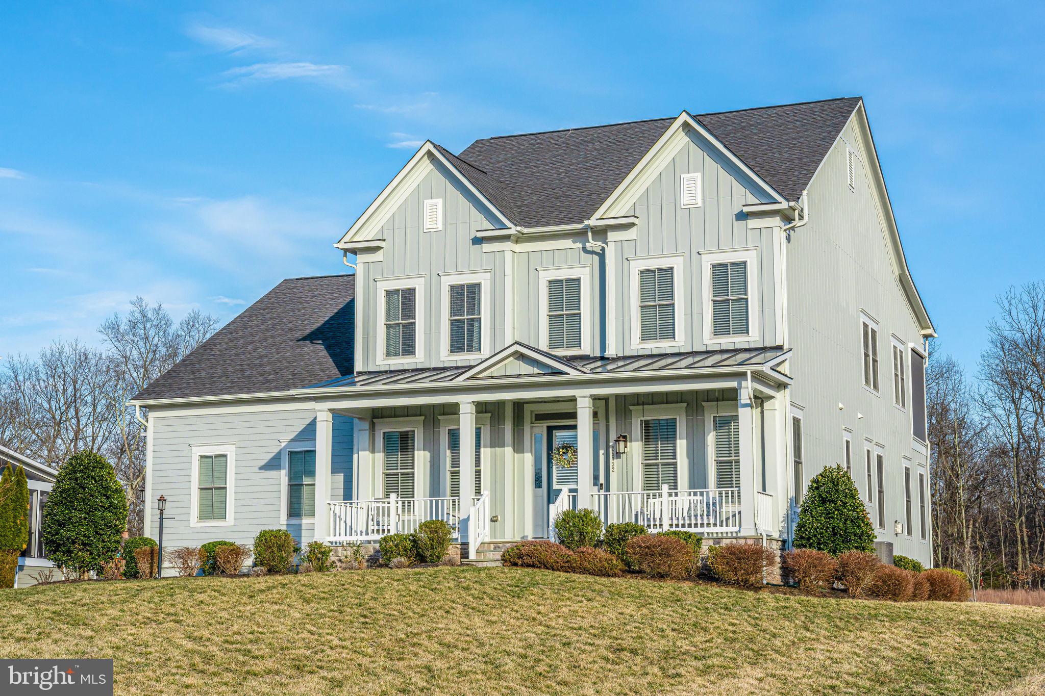 Step into your forever home, where every corner whispers elegance and every detail has been crafted to steal your heart. This is more than a home; it’s a love story waiting to be written, with upgrades that make it truly one of a kind.

As the sun sets, its golden hues grace the facade, welcoming you to a haven of warmth and beauty. The primary suite is a retreat with a spacious walk-in closet for your most cherished belongings, a private deck adorned with a custom privacy screen, and an oasis-like bathroom that invites you to unwind and dream.

On the upper floor, you'll find a thoughtfully designed space that celebrates family and togetherness. This level also features a delightful full bedroom with an en-suite bathroom and two additional bedrooms connected by a charming Jack-and-Jill bathroom, perfect for fostering connection and creating lasting memories. The conveniently located laundry room ensures that daily routines are a breeze. The upper floor offers four bedrooms and three full bathrooms, blending comfort and functionality seamlessly.

On the main level, the enchantment continues with a full bedroom and en-suite bathroom, creating a welcoming retreat for cherished guests. The half bath adds thoughtful convenience, while the oversized kitchen becomes a stage for culinary artistry—a dream come true with its custom cabinets and open design that naturally brings hearts and conversations together. The light-filled breakfast nook, framed by breathtaking views, offers a magical start to your mornings, where every sunrise feels like a promise of something beautiful.

The family room, adorned with a custom fireplace, becomes the soul of the home—a warm, inviting haven complete with a cozy reading nook, perfect for escaping into a favorite story. Step into the indoor porch, where automatic screens transform the space into a tranquil sanctuary. Here, you can savor your coffee, watch the world awaken, and let time slow down most romantically.

The basement is a treasure trove of possibilities: an expansive open area for lively gatherings, a mini kitchen with a sink, a full-size refrigerator, and a beverage fridge to keep the celebrations flowing. A full bedroom, bathroom, and a dedicated gym ensure a place for every passion and purpose.

This home isn’t just filled with upgrades—it’s filled with heart. From its stunning entrance to its lovingly designed spaces, this home is where every day feels like a romantic getaway. This is the home you’ve been waiting for, and it’s ready to welcome you with open arms.

This home is located in the award-winning Willowsford Community, framed by the natural splendor of Loudoun's wine country. The resort-style amenities include community events, outdoor beach-entry swimming pools, a splash pad, a lodge, a fitness center, a lake, dog parks, tot lots, a sledding hill, and even a treehouse! Don't miss the neighborhood farm stand/CSA. This is only a short drive to Brambleton Town Center and One Loudoun dining, shopping, and entertainment. Convenient access to Hal and Berni Hanson Regional Park (257 acres!), local farmer's markets, Wegmans, Dulles International Airport, and the lush Loudoun countryside - bustling with the latest wineries and breweries! Easy commutes to Dulles/Tysons/DC and Silverline METRO—highly sought-after Loudoun County public schools.

* This address serves two Elementary schools; Henrietta Lacks ES, serves K-2, and Hovatter ES serves 3-5