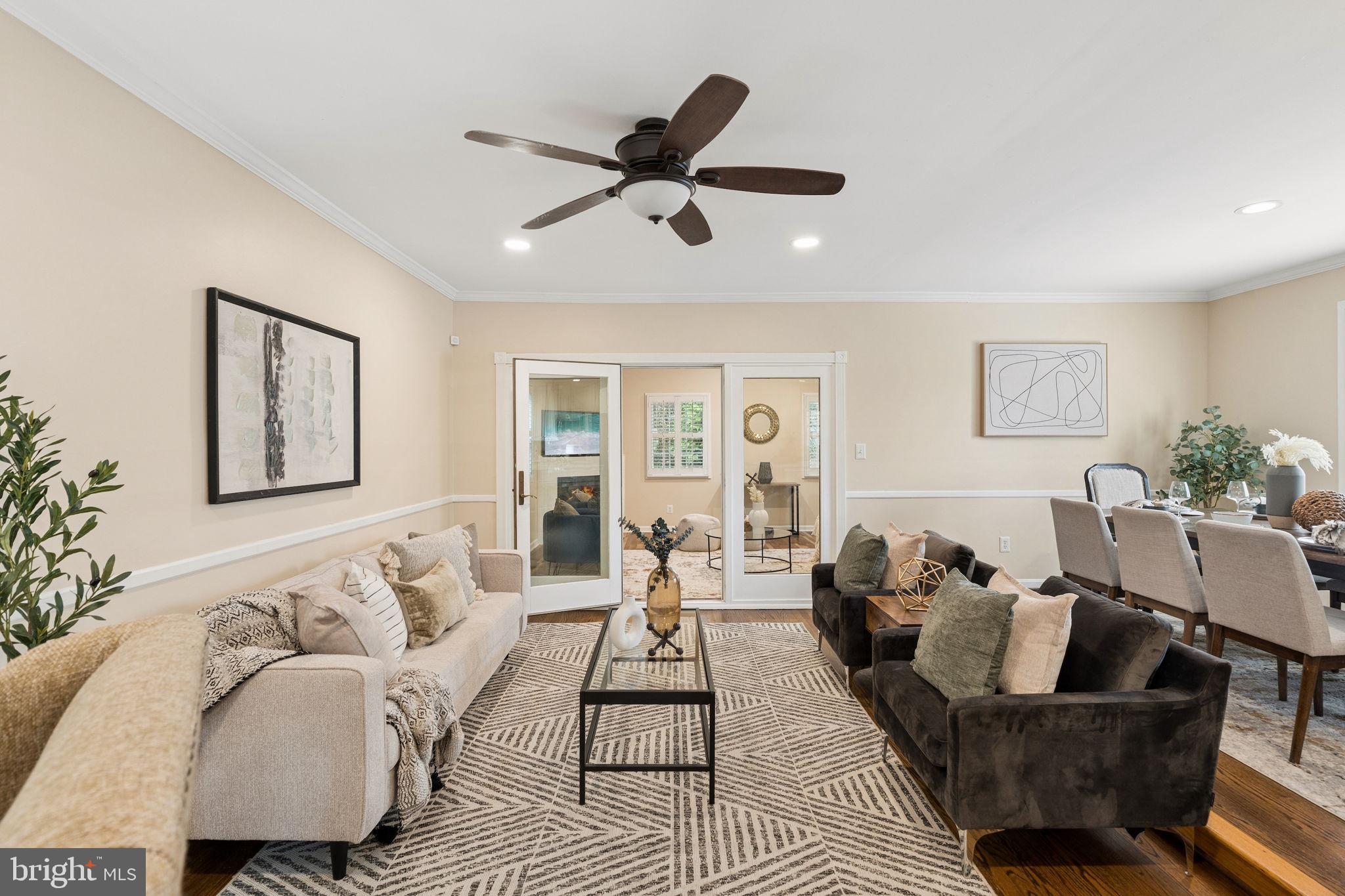 Welcome to this picturesque updated 4-bedroom, 3 full-bath home in the highly sought-after Orchard Hills community of Lutherville-Timonium.  This spacious residence offers the perfect blend of modern updates, functional living space, and timeless charm. Step inside to discover an open and inviting floor plan highlighted by gleaming wood floors, neutral paint, recessed lighting, crown molding, chair rail accents, and ceiling fans throughout. The heart of the home is the updated kitchen, featuring quartz countertops, stainless steel appliances and a spacious center island ideal for cooking, gathering, and entertaining. Designed for comfortable everyday living, the home offers multiple living and gathering spaces, including a spacious family room with vaulted ceilings, anchored by a beautiful gas fireplace. With four generously sized bedrooms and three full bathrooms, one on each level, there is ample space and flexibility for family, guests, or a home office.  Outside, enjoy your own private retreat in the fully fenced backyard. The serene outdoor space features a large deck, expansive patio area, and storage shed, creating the perfect setting for outdoor entertaining, gardening, or simply relaxing. Ideally located within walking distance of Orchard Hills Park, offering a playground, basketball courts, and athletic fields, this home also provides convenient access to York Road, I-695, and I-83 making it easy for you to come on home.