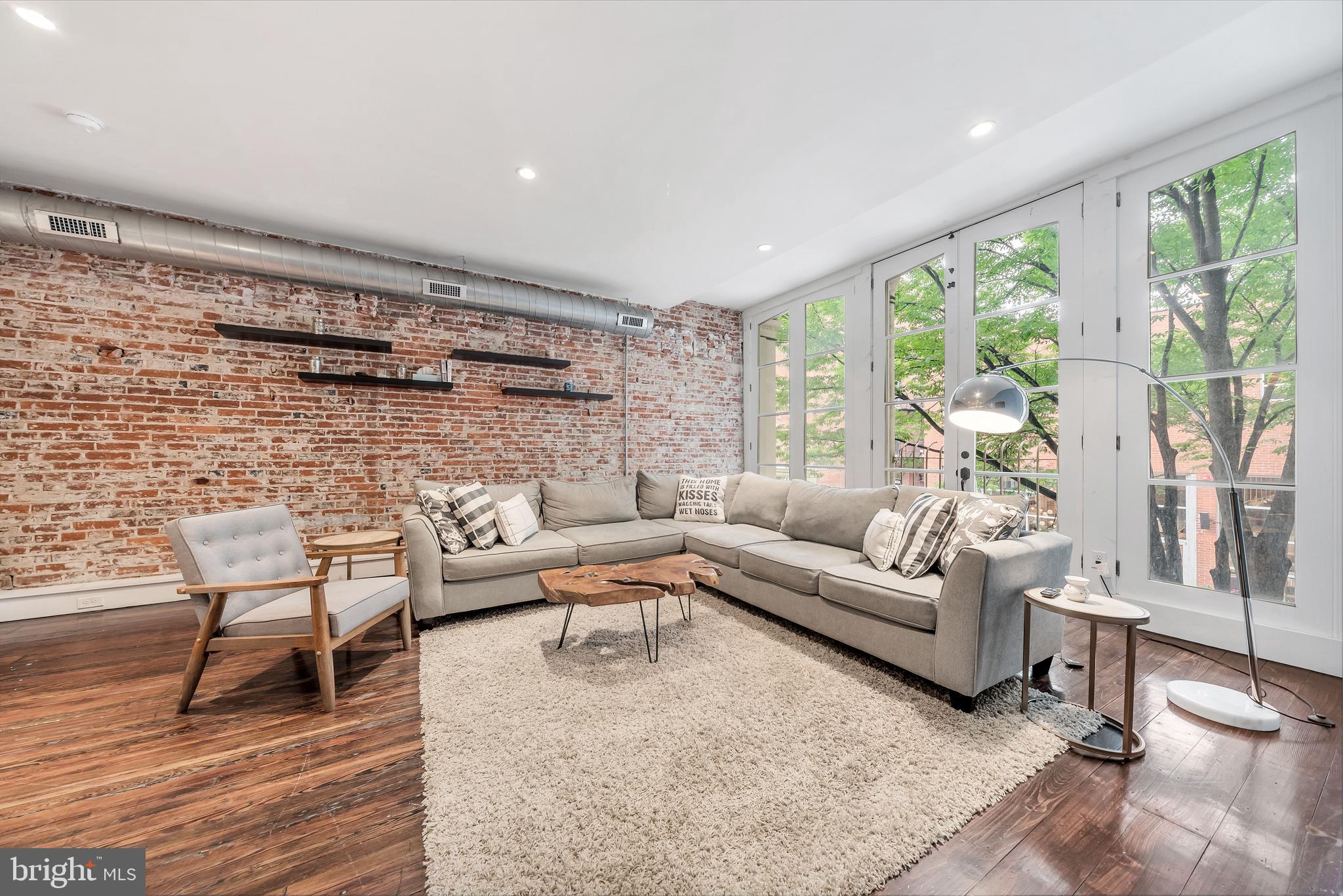 Gorgeous newly renovated unit available in desirable Old City location. This 2 bedroom/2 bath unit boasts of original hardwood floors, exposed brick, upgraded kitchen w/ Stainless Steel appliances and a washer/dryer located in unit. An elevator that goes directly to the unit. There are also beautiful French doors and gorgeous bay windows overlooking an incredible view. The unit is absolutely stunning and is in a great, walk-able location surrounded by tons of restaurants and nightlife!