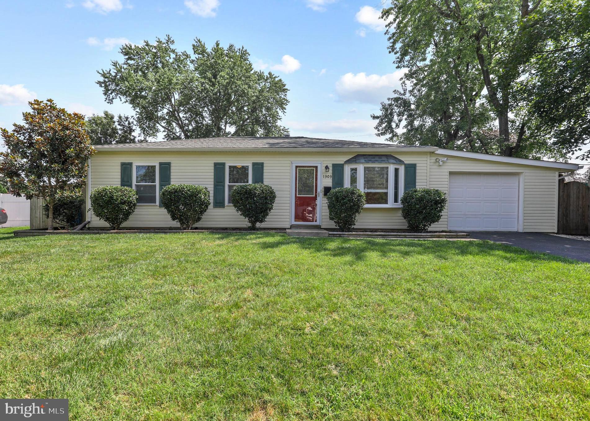 Beautiful, move-in ready rancher with an oversized one car garage, 3 bedrooms, 1 full bath, with many updates throughout. Recent interior updates include LVP flooring throughout the main living area, fresh paint throughout, newly carpeted bedrooms, an updated full bath, and a full-sized laundry room equipped with brand new plumping, washer, and dryer. Gorgeously renovated eat-in kitchen with 42” soft close cabinetry, granite countertops, stainless steel appliances, and marble tile backsplash that opens into a large bonus family room with cathedral ceilings and a large slider that leads out to the patio. Perfect for enjoying your morning coffee or hosting family and friends. But wait there’s more! There’s a spacious, privacy fenced in back yard with two sheds that convey with the property. Other updates include a new roof (2019) and newer windows (2015).