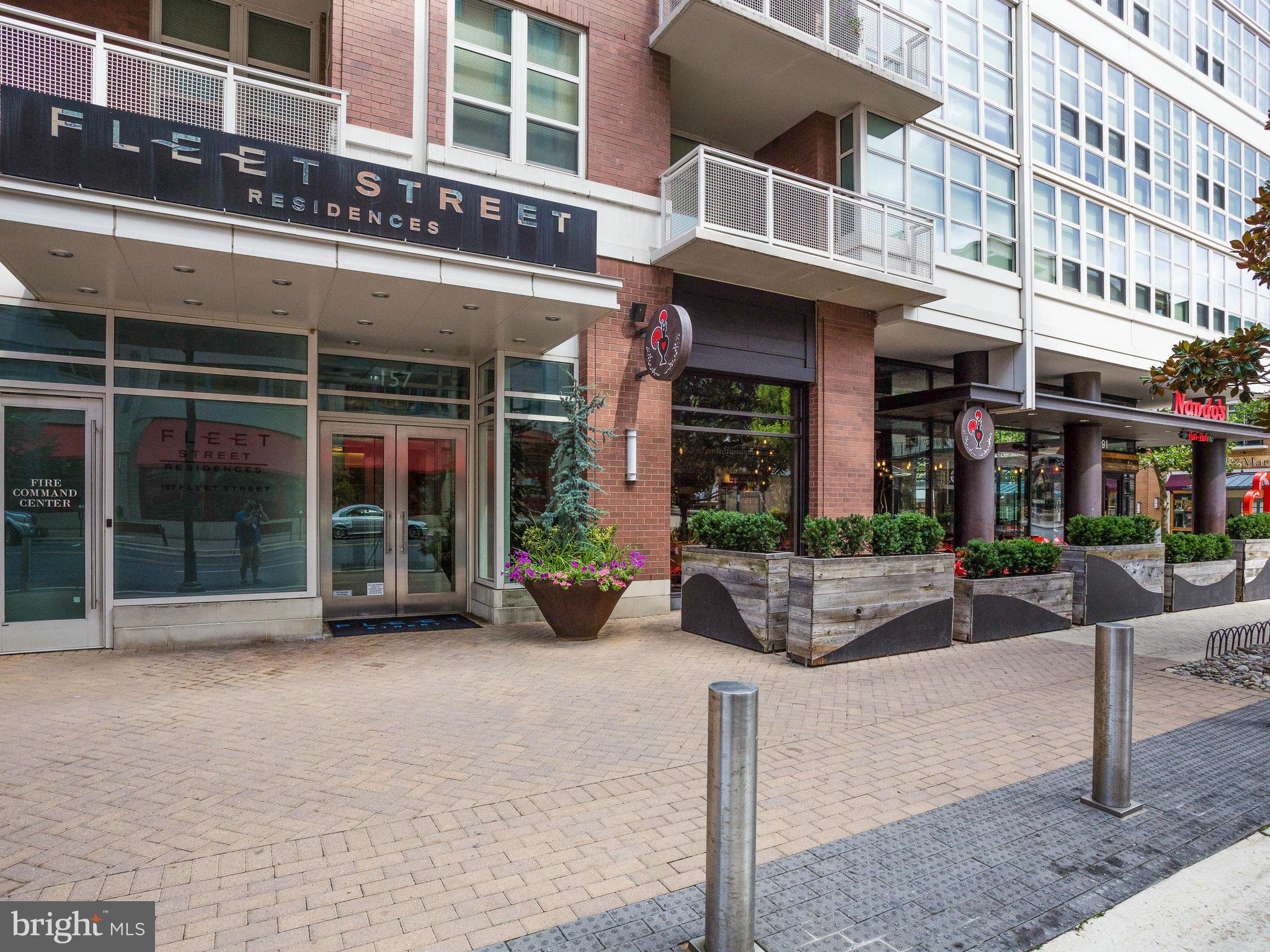 Beautiful 2 Bedroom/2 Bath in sought after Fleet Street Condominium. Hardwood Floors, Quartz Counter tops, Ceramic Tile in Kitchen & Bathroom. Lovely Balcony with great water views. Two Parking Spaces, plus Storage! Fitness Center, bus shuttle to Old town Metro. Shows like a model, must see. Restaurants and shopping, waterfront living with water taxi access.