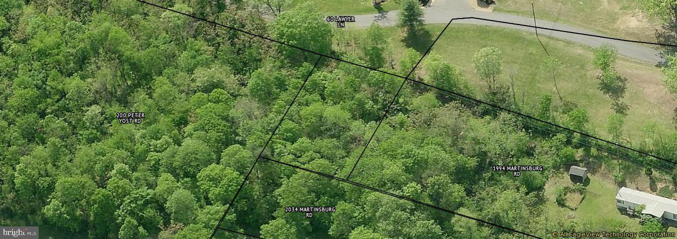 Wooded Lot located close to Route 9 outside of Berkeley Springs. Commuting Distance to Martinsburg, Hancock & Winchester. Surrounded by upscale homes and amazing views.