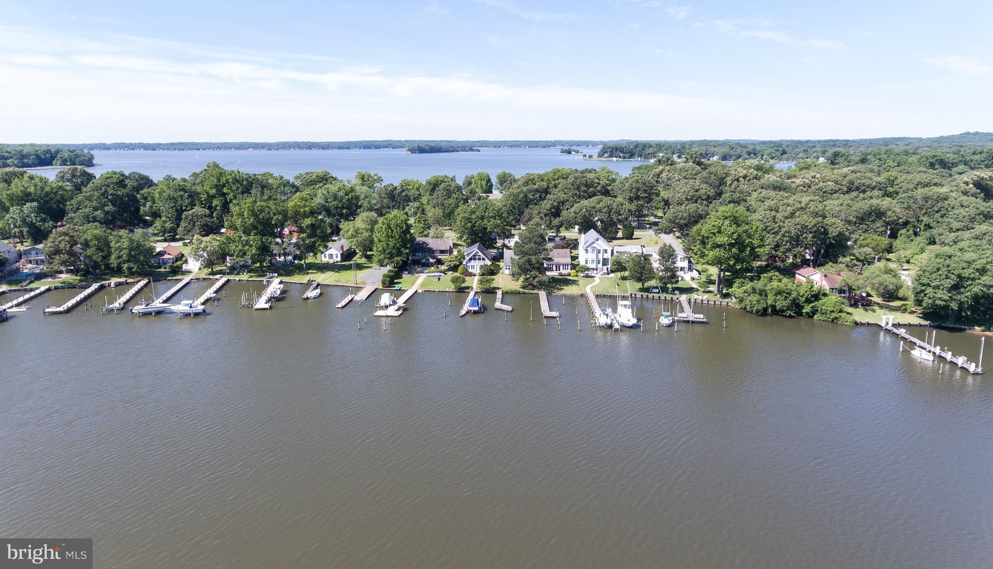 AMAZING WATERFRONT HOME WITH STUNNING VIEWS!!!A MUST SEE .ALL NEW FURNACE,HOT WATER HEATER,A/C, SEPTIC& SIDING.GOURMET KITCHEN WITH GRANITE AND SS APPLIANCES&CUSTOM CABINETS WITH COZY DINNING AREA.BEAUTIFUL OPEN FLOOR PLAN.MASTER BEDROOM & BATH ON MAIN LEVEL.GLEAMING HARDWOOD FLOORS W/ GORGEOUS UPDATED BATHROOMS.PROFESSIONALLY LANDSCAPED. ENJOY YOUR OWN PRIVATE PIER!!!A MUST SEE....