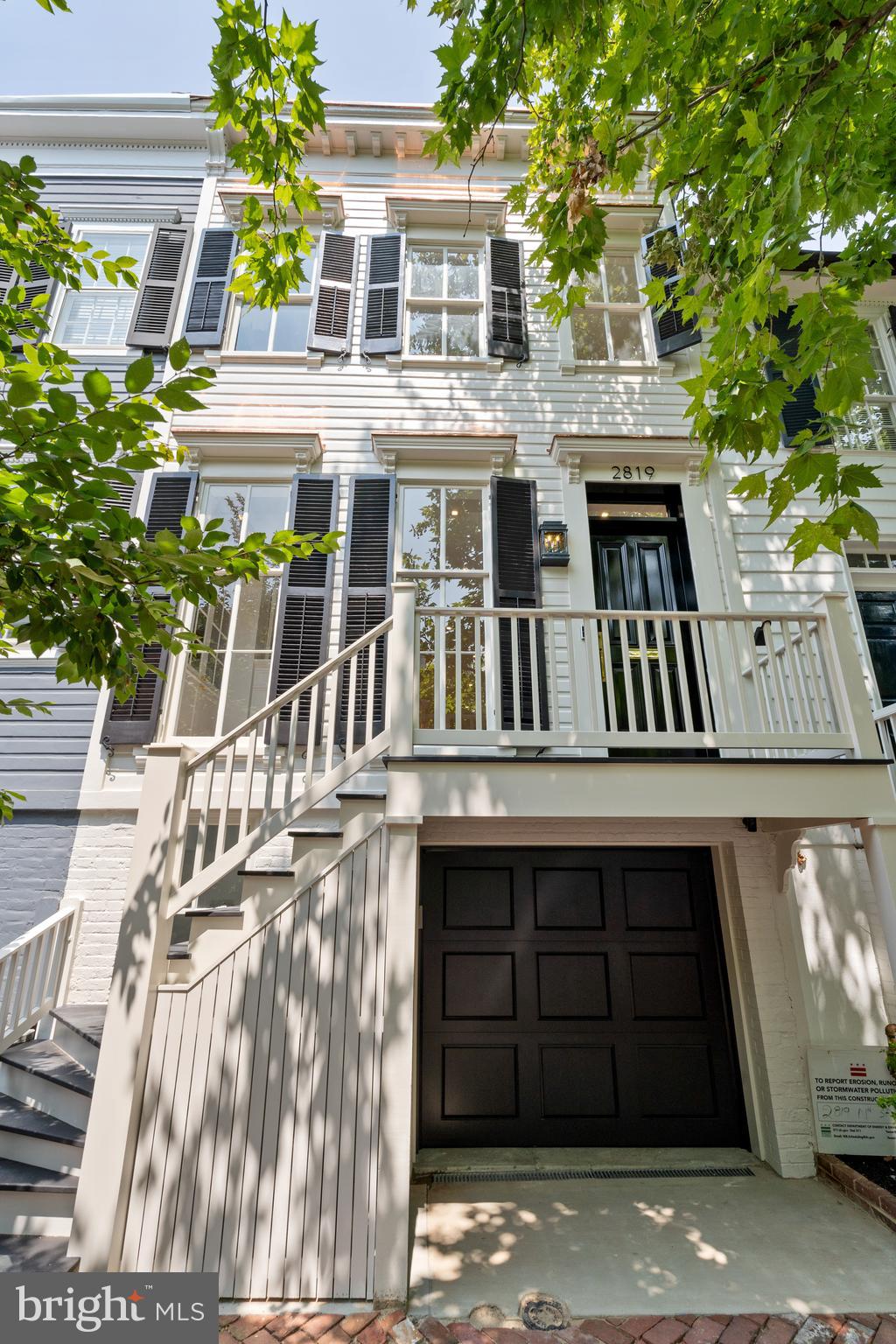 Another stunning renovation by Akseizer Residential! 2,835 total SF of bespoke, custom finishes throughout with rare 1-car garage parking in Georgetown's East Village! The Main Level with high ceilings and 7.5" white oak flooring features a large Living Room with fireplace open to the Gourmet Chef's Kitchen with Wolf, SubZero, and CornuFe appliances, as well as calacatta countertops and Waterworks fixtures. The Dining Room opens to the walkout two-tiered rear patio with fireplace and built-in outdoor Blaze grill for easy al fresco dining. The Second Level includes a generous Primary Suite as well as 2 additional bedrooms and a hall bath. The Lower Level includes an additional bedroom, full bath, recreation room, laundry room, and access to the 1-car garage with plenty of storage space.