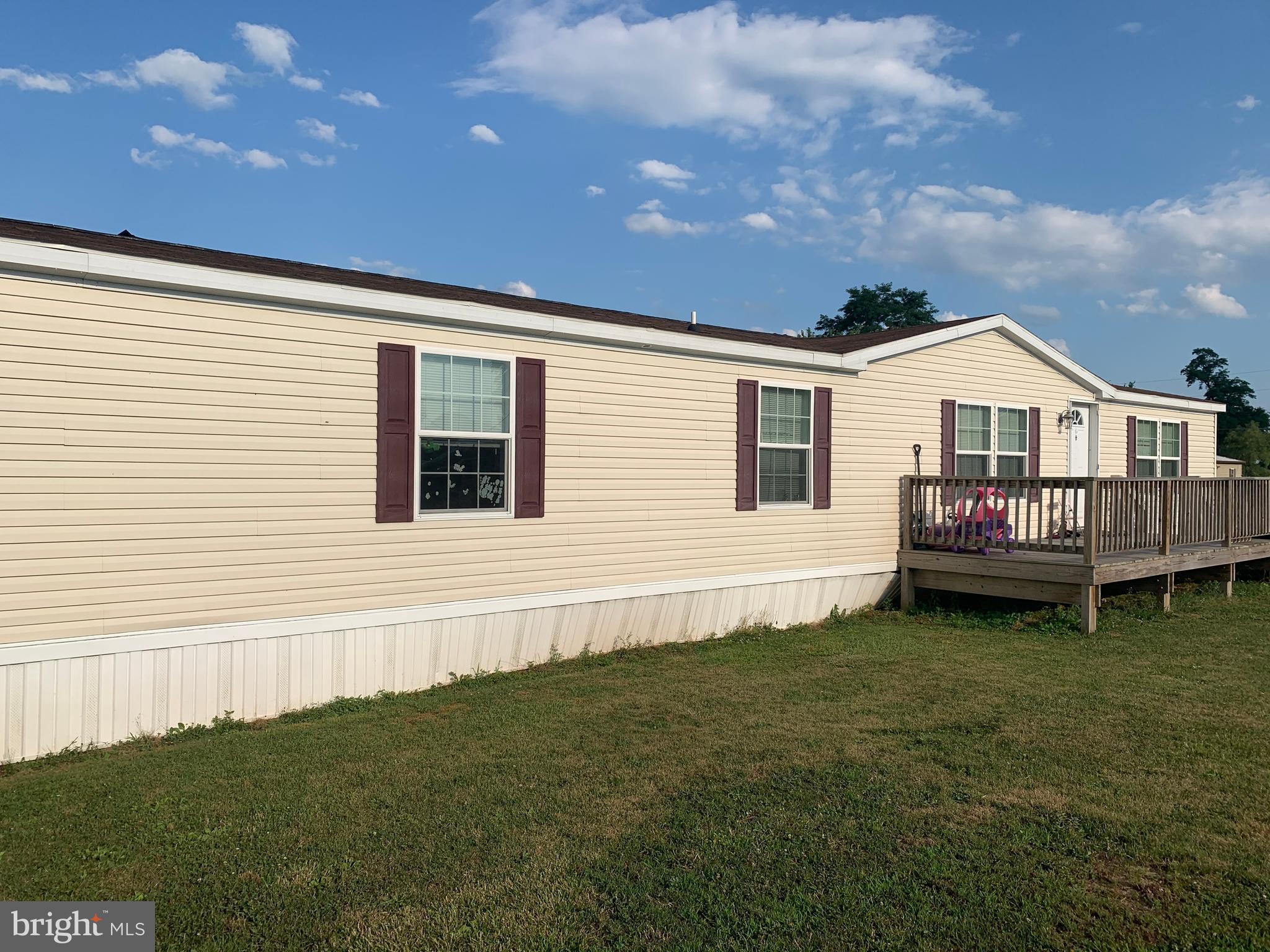 Beautiful double-wide manufactured home in Chesapeake Estates. With over 2,000 square feet of living space, this newer model offers you all the room you could need! Your new master bedroom with its en suite bathroom provides an oasis inside this spacious home, which is complemented by the large living room with a corner fireplace. The country setting of the park belies the convenience and amenities which are just a short drive away.  Come see for yourself why you should make this your home for the long haul!