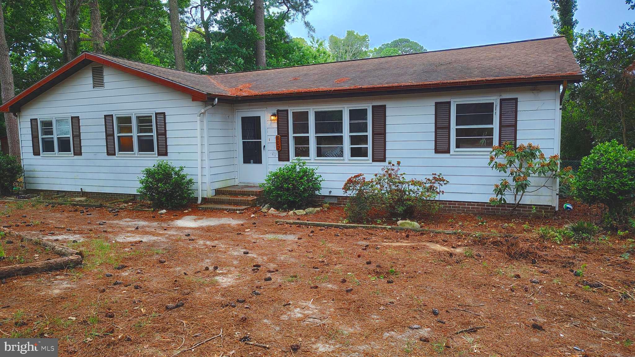 3 bedroom 2 bath  rancher with an eat in kitchen, living room ,separate dining or family room. Also features a large 3 season porch which opens to a rear open deck. Lots of storage space including a floored attic, many closets. City water and on site septic City sewer will be available in the near future.