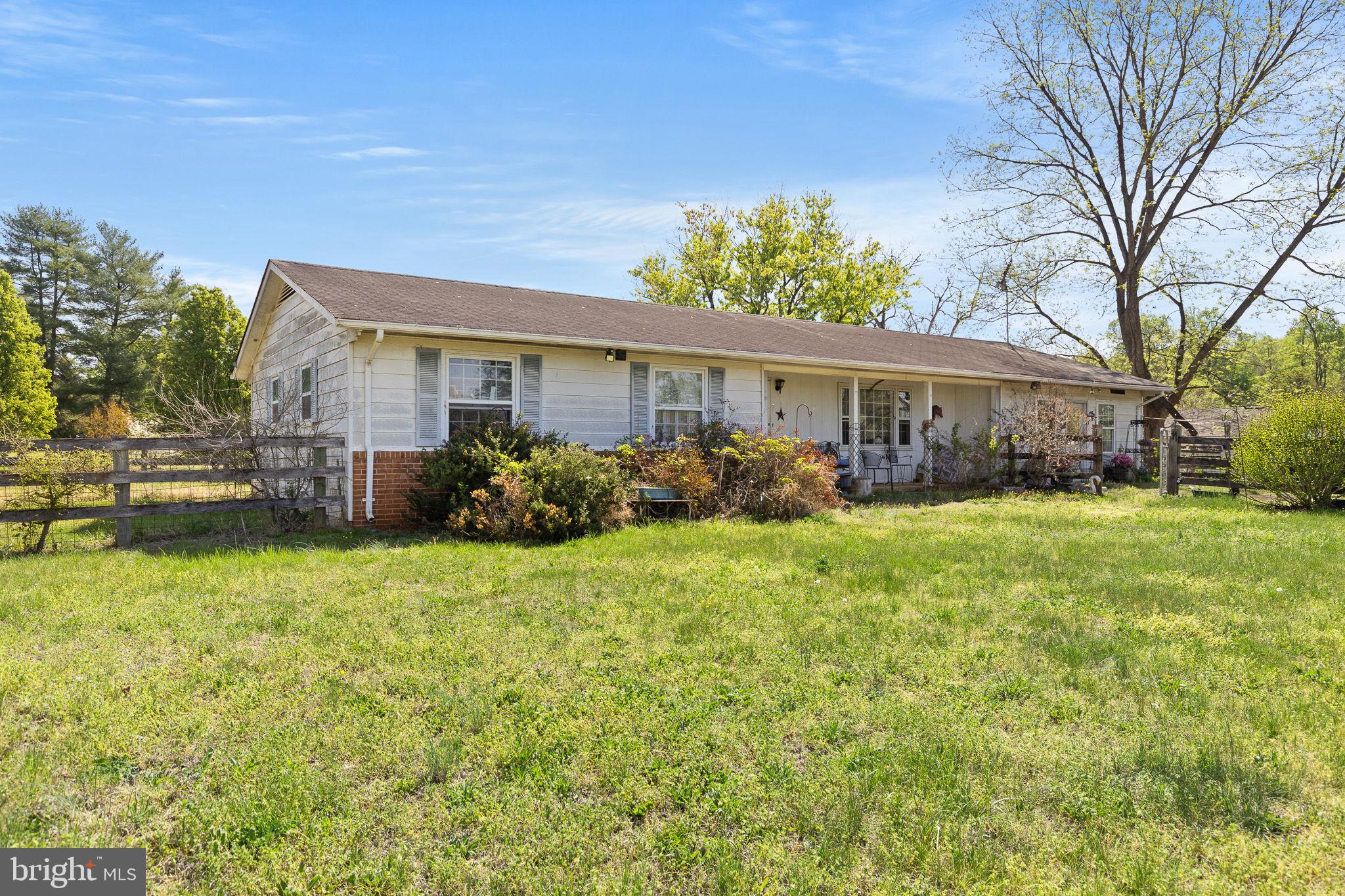 Searching for an affordable, horse-ready farmette in a location that truly works for both everyday living and equestrian life, this is one you don’t want to miss. Set on 5 private acres just minutes from downtown Orange, this property offers a functional setup for horses with the kind of convenience that’s hard to find.

The land is fully fenced and cross-fenced with board fencing and electric rope, supported by solar chargers for ease of use. The layout is practical and efficient, making daily care, turnout, and rotation simple whether you have one horse or several. Four solid oak run-in sheds, each with front gates and side double Dutch doors, provide dependable shelter and flexibility throughout the seasons.

The barn adds even more value with a concrete floor and 240-volt electric already in place, ideal for a workshop, feed room, or future stall conversion. Inside, two 6x8 kennels with guillotine doors offer additional space for dogs, chickens, or general farm use.

The home offers 3 bedrooms and 2 full bathrooms and is ready for its next chapter. While it has solid bones—including hardwood floors in the bedrooms, a newer stove and vent hood, and an HVAC system replaced in 2016—it will need updating and cosmetic attention. For the right buyer, this is a chance to create a home that fits your style while already having the farm infrastructure in place, a combination that’s getting harder to find at this price point.

A large deck with a built-in gazebo overlooks the property, giving you a peaceful spot to start your mornings or unwind after time in the saddle. There is also a bonus den or office with its own private entrance, offering flexibility for a home office, mudroom, or additional living space.

Location is a standout feature, just about 4 minutes to the town of Orange for restaurants, shops, breweries, and everyday essentials. For equestrians, you’re approximately 25 minutes to HITS Culpeper, 40 minutes to Charlottesville, and just over an hour and a half to the Virginia Horse Center, making this an ideal home base for both local riding and competition.

With no HOA and a fully usable setup already in place, this property is perfect for someone who values land and horse infrastructure first and is ready to put their personal touch on the home.

Home is being sold as-is. 24-hour notice required for showings.