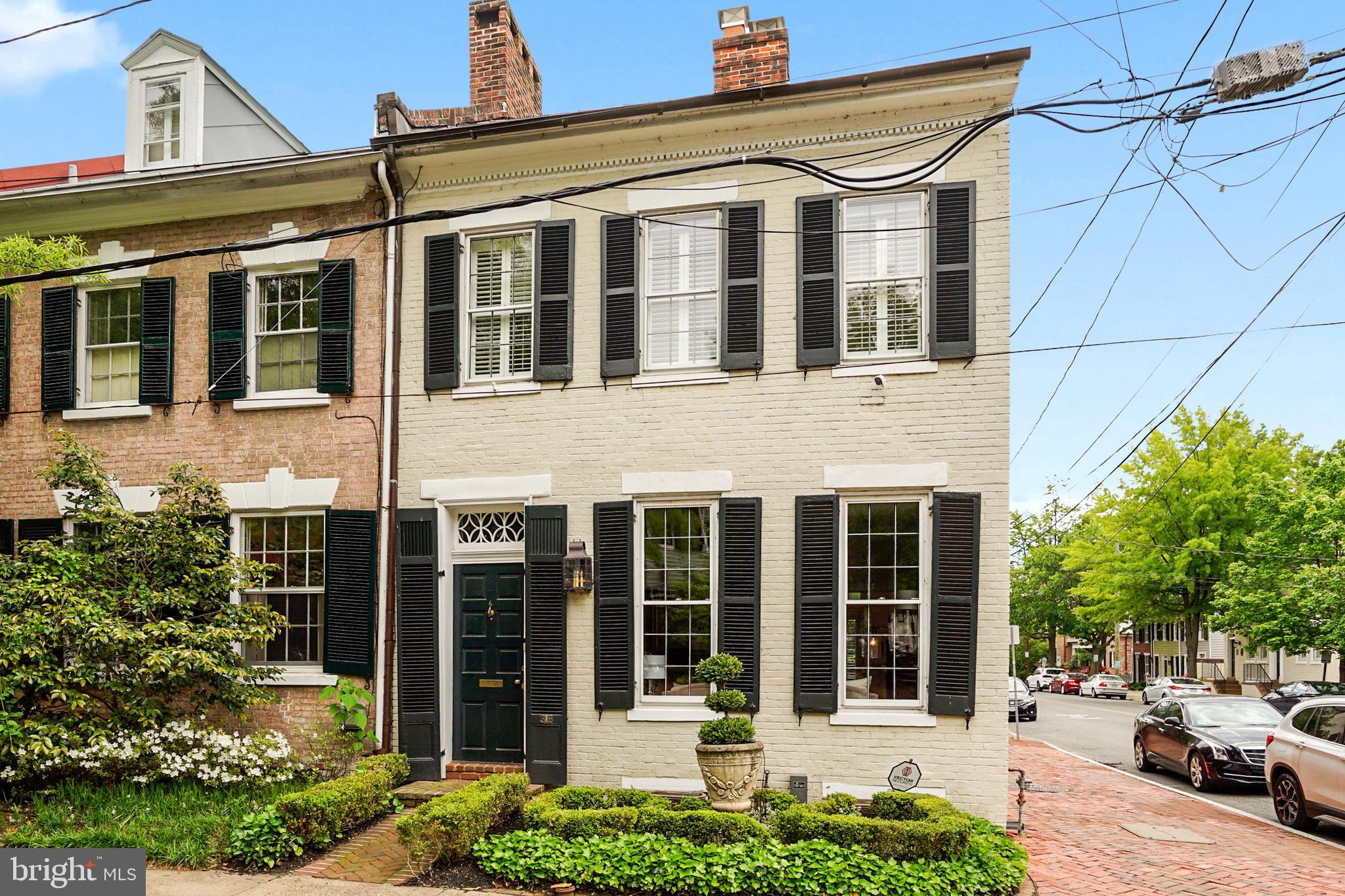 Spacious and beautiful historic corner townhome  in the SE quadrant of  Old Town was built in 1810.  Three bedrooms, two and a half baths. Estimated 2,778 square feet.  Spacious living room with cozy wood burning fireplace, formal dining room perfect for hosting guests, renovated eat-in kitchen with Wolf, Sub-zero appliances and quartz counters. Hardwood floors give it a classic and elegant feeling. Finished  lower level has a family room perfect for watching  sports, movies, and gatherings. Oversized Laundry room and ample storage space. Welcome Home!!