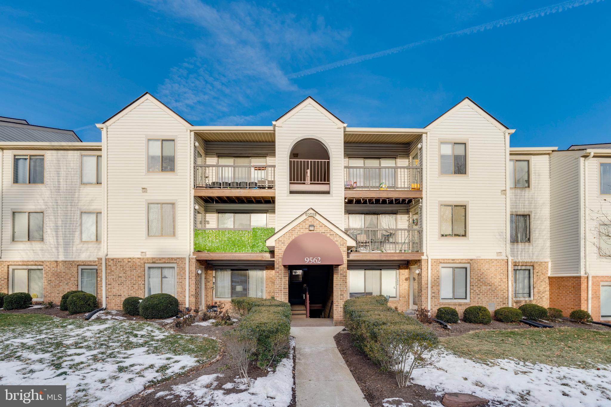 Welcome to this beautifully updated two bedroom, one bathroom condo in the heart of Manassas, in the Battery Heights subdivision.  This unit features a soft neutral designer color palette, updated lighting, plush carpet and luxury vinyl flooring throughout the home. Gather and entertain or relax in the spacious light filled living room and dining area.   Enjoy the updated eat in kitchen with gleaming granite countertops, custom backsplashes, and a breakfast nook that opens to a private balcony overlooking common area and trees.  The primary bedroom boasts plush carpet, a walk-in closet, and private vanity area and access to the well-appointed dual entry bath. This condo is equipped with a laundry room with full sized washer and dryer and cabinetry in-unit, adding to the convenience of daily living. Building amenities, include a pool, a clubhouse, and a well-equipped gym. Don't miss the opportunity to make this lovely condo your new home. Located next to major highways, restaurants, shopping centers and so much more.