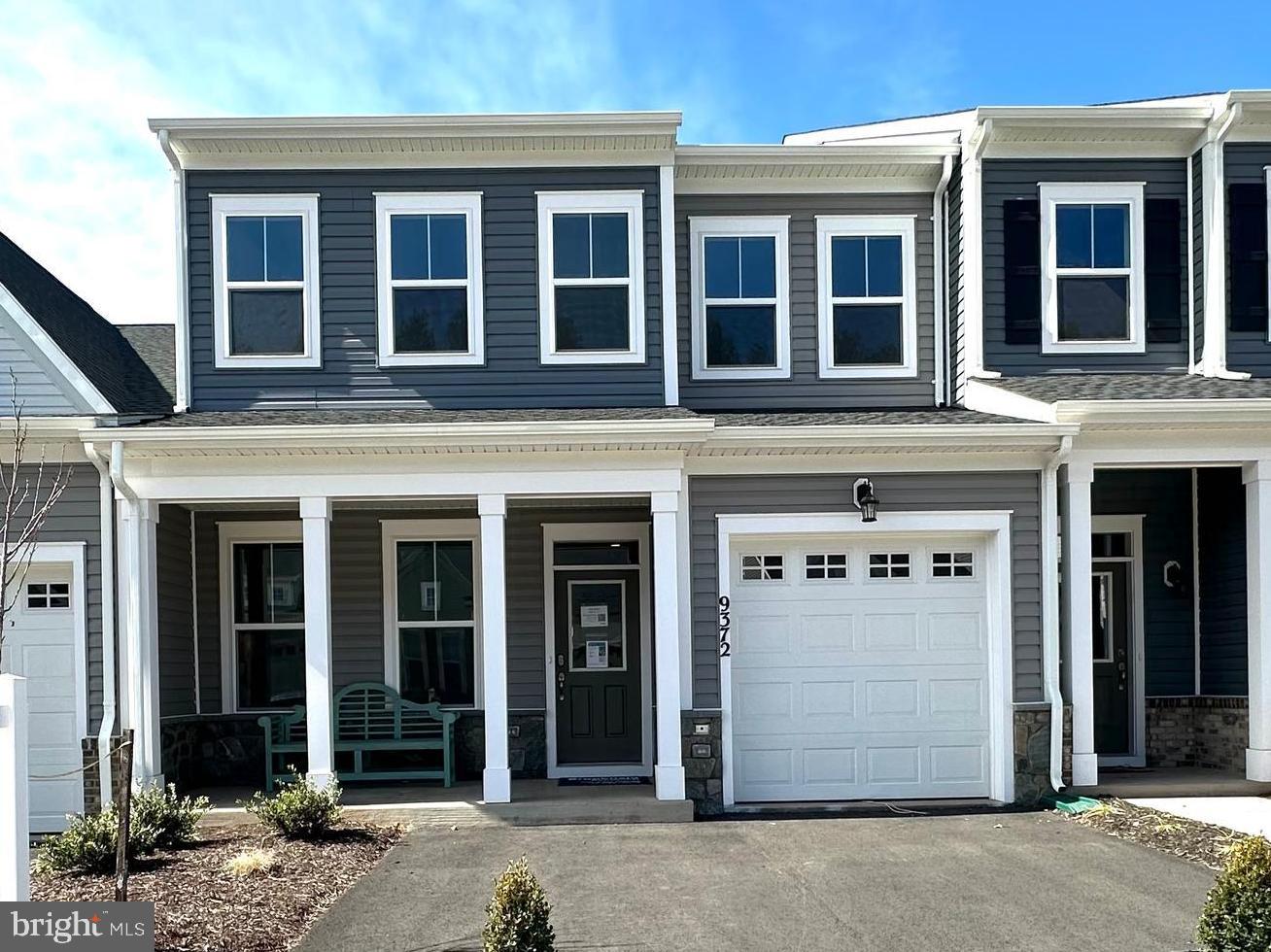 This Brand New Versailles villa at The Crest at Linton Hall, an active adult community for persons 55+, is Ready for move in!!
As you step inside you find the open main level design, making gatherings and entertainment a breeze. The great room and dining room are seamlessly open to the the spacious kitchen at the rear of the home.
The kitchen boasts a large eating bar island, Carrara Marmi quartz countertops, paired with crisp white cabinets and satin nickel bar pulls, a built in buffet cabinets and pantry, creating a fresh and modern feel. Tucked away in the rear of the home is the main level primary suite featuring a large en suite  and two walk-in closets. The primary en suite is bright with white cabinets and Carrara Marmi quartz countertops. The main level also features a convenient laundry room located off the garage. 
Head upstairs to the upper level where you'll be welcomed by a generous loft space, two additional secondary bedrooms, each boasting walk-in closets, and an extra full bathroom. Outside, a concrete patio awaits, perfect for enjoying outdoor meals and gatherings.
Located within The Crest at Linton Hall, a new Brookfield Residential community for adults that are 55 or better! Community includes 2 pickleball courts, bocce, horseshoe pit, community garden, covered outdoor kitchen with seating area plus a paved trail to Broad Run Regional trail system! 
Closing cost assistance is available!