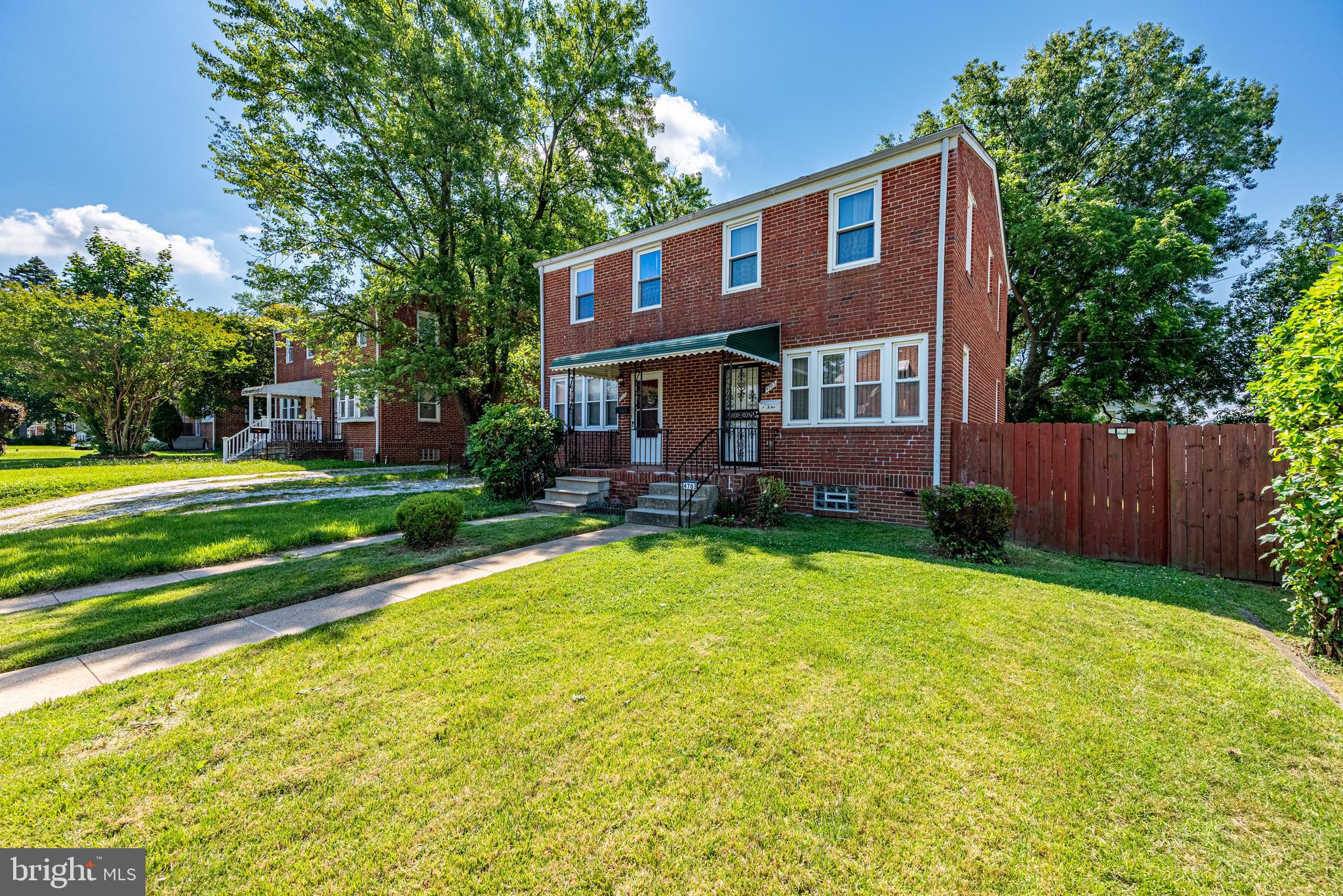 This lovely 2-bedroom, 1.5 bath all brick semi-detached townhome in Gardenville is waiting for the right buyer to come by and take a look while it's still available. Whether you are downsizing or a first-time homeowner you won't be disappointed because the seller has really taken care of the property for you. Updates include the furnace, air condition, shingle roof, both bathrooms, and insulation in the attic to keep the energy cost down, as well as a floor installed in the attic too. All the appliances convey with the property so there's no need to purchase any right away. The main and upper levels have beautiful hardwood floors and matching wood trim throughout. Looking for a home with a seperate dining room, this is it. The dining room includes a marble top breakfast barwith chairs, and the seller is leaving a wall mount TV for your enjoyment while dining. Now that I told you about some of the features inside the house, you don't want to miss the views from the front and rear porches. The large rear fenced yard is totally private  and would be great for those summer gatherings with friends and family. You will also enjoy the view of the  neigborhood from the front porch too. So contact your agent and tell them that you want to see this property before it's too late.