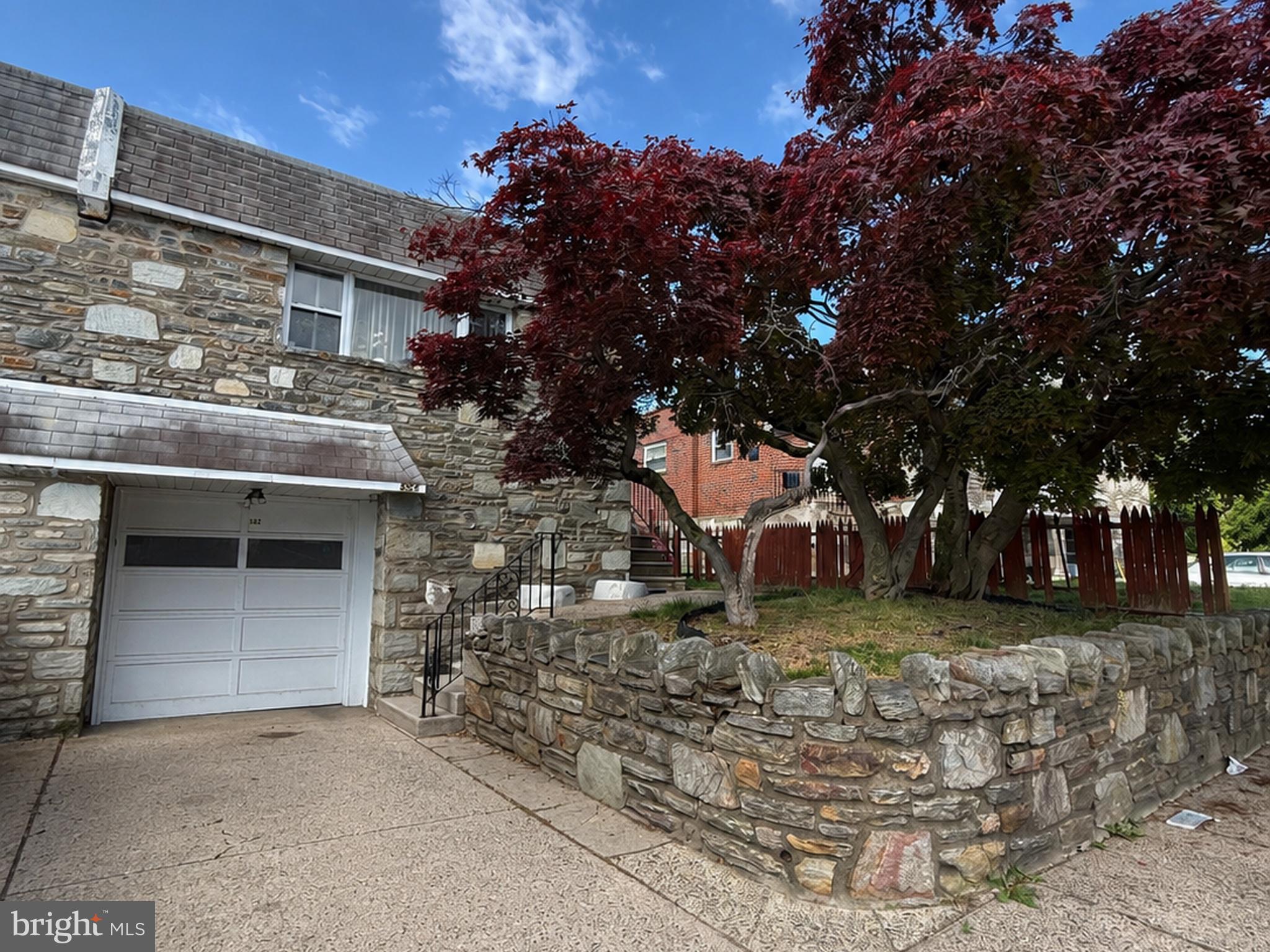 Currently Tenant Occupied. Located in Somerton, this charming stone and brick twin offers spacious living and convenient amenities throughout. The main level features a bright and inviting living room, formal dining room, and an eat-in kitchen with stainless steel appliances. Down the hall you’ll find two comfortable bedrooms and a hall bath along with the primary en-suite. The finished lower level includes a large family room, powder room, laundry area, and access to the attached garage. A private driveway provides additional off-street parking. Conveniently located near major transportation, shopping, dining, and everyday essentials, this home combines comfort, space, and accessibility.