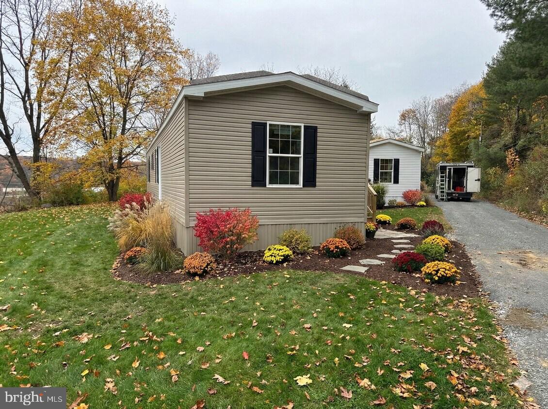 This brand new home built by Eagle River Homes in the fall of 2025 is over 1000 sqft, has 3 bedrooms, 2 full bathrooms and comes with a new oven, refrigerator and dishwasher. The only appliances not included are a washer and dryer. Utility expenses are minimized via propane heating and the lot fee includes water and sewer.