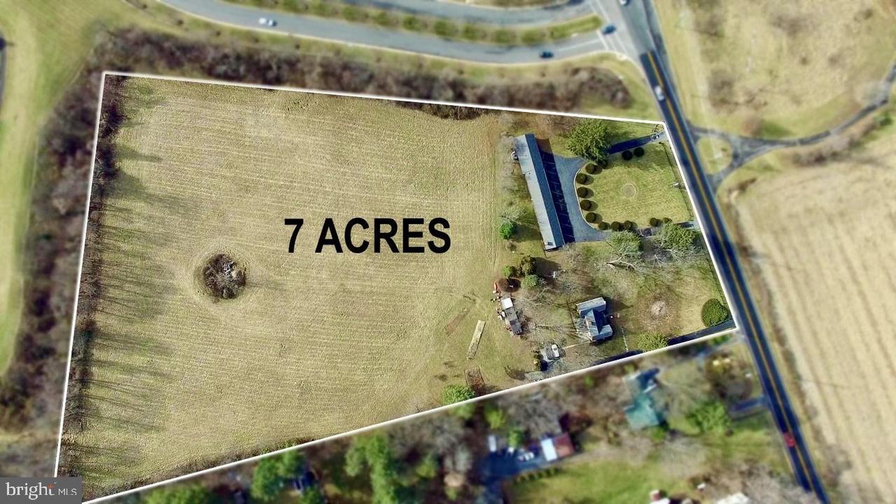 Endless Potential in Western Loudoun – A Landmark Opportunity Awaits

Discover one of the most unique and versatile properties in western Loudoun County. Located just east of Round Hill with high visibility from Route 7, this exceptional 7-acre property presents a rare opportunity for a variety of residential, agricultural, or business uses. The property features a brick home along with an additional 8-room building, offering flexibility for a private estate, business ventur, retreat, or agricultural operation.

Ideally positioned near the historic town of Round Hill and just minutes from Purcellville, the location provides convenient access to charming shops, restaurants, and local attractions while maintaining the tranquility of Loudoun’s countryside.

Enjoy close proximity to Loudoun County’s renowned wineries, breweries, and farm-to-table dining, as well as outdoor recreation including the Appalachian Trail, Shenandoah River, and the Blue Ridge Mountains. Farmers markets, community events, and artisan shops in nearby Round Hill and Purcellville further enhance the area's appeal.

Commuters will appreciate the easy access to Route 7, placing Leesburg approximately 15 minutes away, Dulles International Airport about 35 minutes away, and Washington, D.C. within an hour.

Zoned AR1, the property allows for a wide range of potential uses including agricultural, residential, and select commercial opportunities. Possible uses may include a boutique winery or brewery, farm-to-table venue, bed & breakfast, retreat space, equestrian or organic farming operation, or a creative commercial venture such as an event venue, artisan market, or studio.

Public utilities run adjacent to the property, offering potential future development possibilities. Some uses may require a Special Exception through Loudoun County.

A rare opportunity to own a distinctive Loudoun County property with exceptional flexibility and long-term potential. Bring your vision and explore the possibilities.