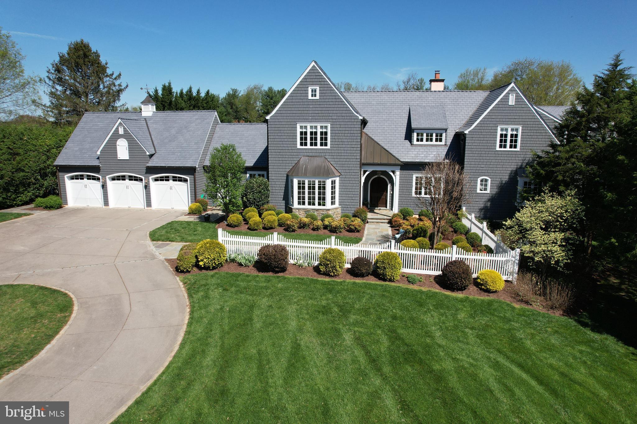 Welcome to this breathtaking Brendan O'Neill custom-built home, where superior craftsmanship and meticulous attention to detail meet to create an unparalleled living experience. Nestled on a sprawling flat 2 acre lot with professionally landscaped gardens, mature trees, and vibrant blooms, this home offers a harmonious blend of elegance and tranquility. Upon entering, you'll be greeted by sun-filled rooms accentuating the home's beautiful features. The main-level boasts a luxurious primary suite with a spacious sitting room, gas fireplace, built-ins, bay window, and indulgent spa-like bath featuring a footed tub, walk-in shower, and dual vanities. The gourmet kitchen is a culinary enthusiast's dream, with an expansive center island and work sink, custom cabinetry, professional stainless steel appliances including a Sub-Zero refrigerator (2019), Viking 6-burner gas cooktop, Viking double wall ovens (2019), and Miele dishwasher (2019). Oversized windows frame the picturesque views of the level backyard and patio, creating a serene backdrop for everyday living and entertaining. Step outside to the large flagstone patio, accessible from both the kitchen and family room, ideal for al fresco dining or relaxing in the serene surroundings. 2-story foyer to the upper-level with 4 generously sized bedrooms and 3 full baths alongside a versatile loft space perfect for a cozy sitting area or home office. A main-level office and powder room provide a secluded workspace, while a separate mudroom entrance offers added convenience with a 2nd powder room, large pantry, and laundry room. The walk-out lower-level features a private guest suite with a full bath, a custom temperature-controlled wine room, recreation room, full bar, gas fireplace, built-ins, pool room, and media/exercise room. 3-car garage, circular driveway, and private cul-de-sac. 3-zoned updated HVAC systems. New roof (2021) and exterior paint (2022). New washer and dryer (2023) This is the one you've been waiting for!