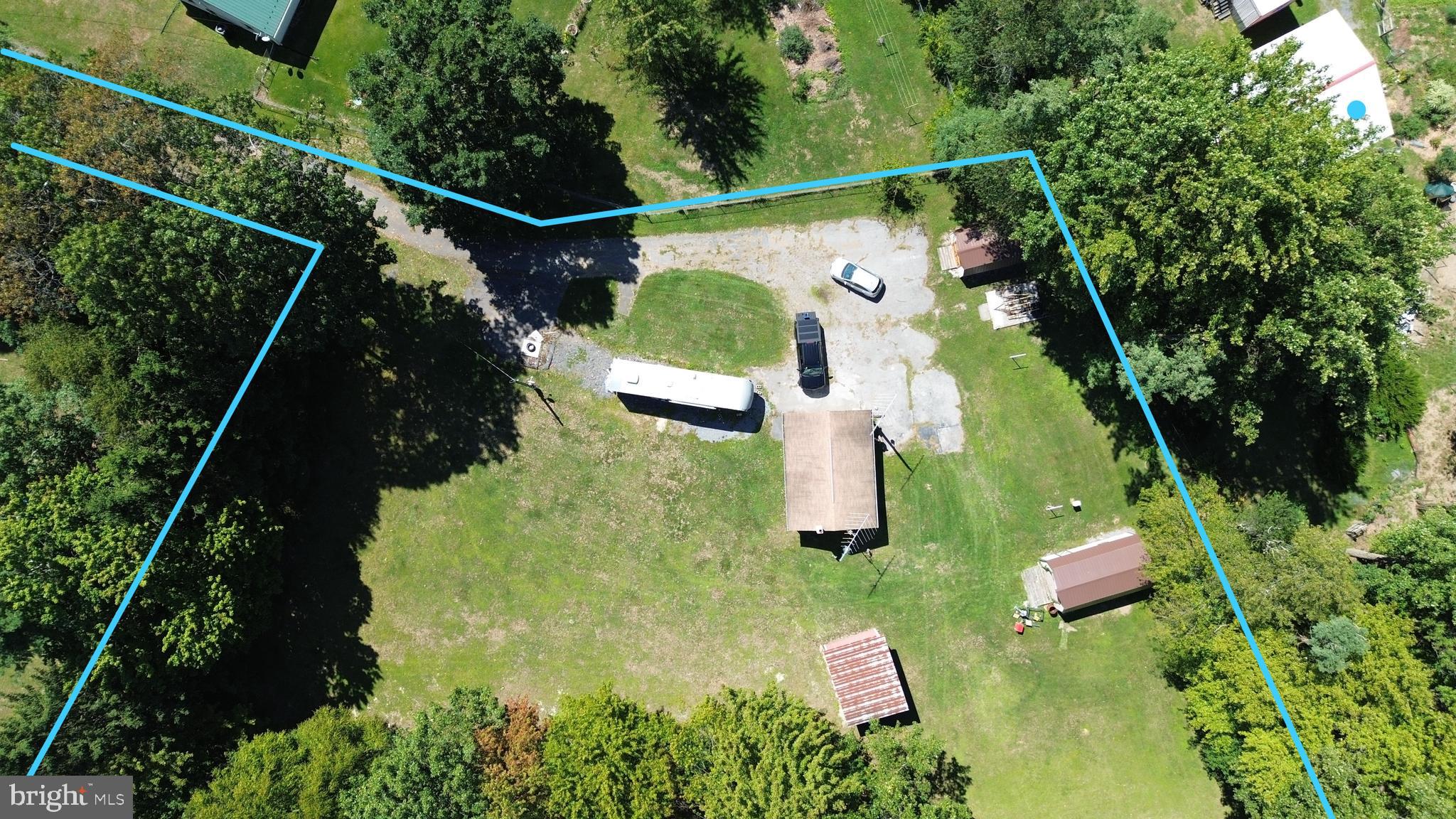 Welcome to Loop Road! It's time to buy dirt! This beautiful South Mountain 1.64 acre lot, right outside of Mont Alto Campus is equipped with a well, septic, and electric! There are three sheds and a garage already on the property!! Two of the sheds have new roofs on them and electricity! The wooded perimeter and open space make this peaceful property the perfect place for you! It's full of opportunity! Call Today to Walk the Property Lines! *property lines in images are estimated*