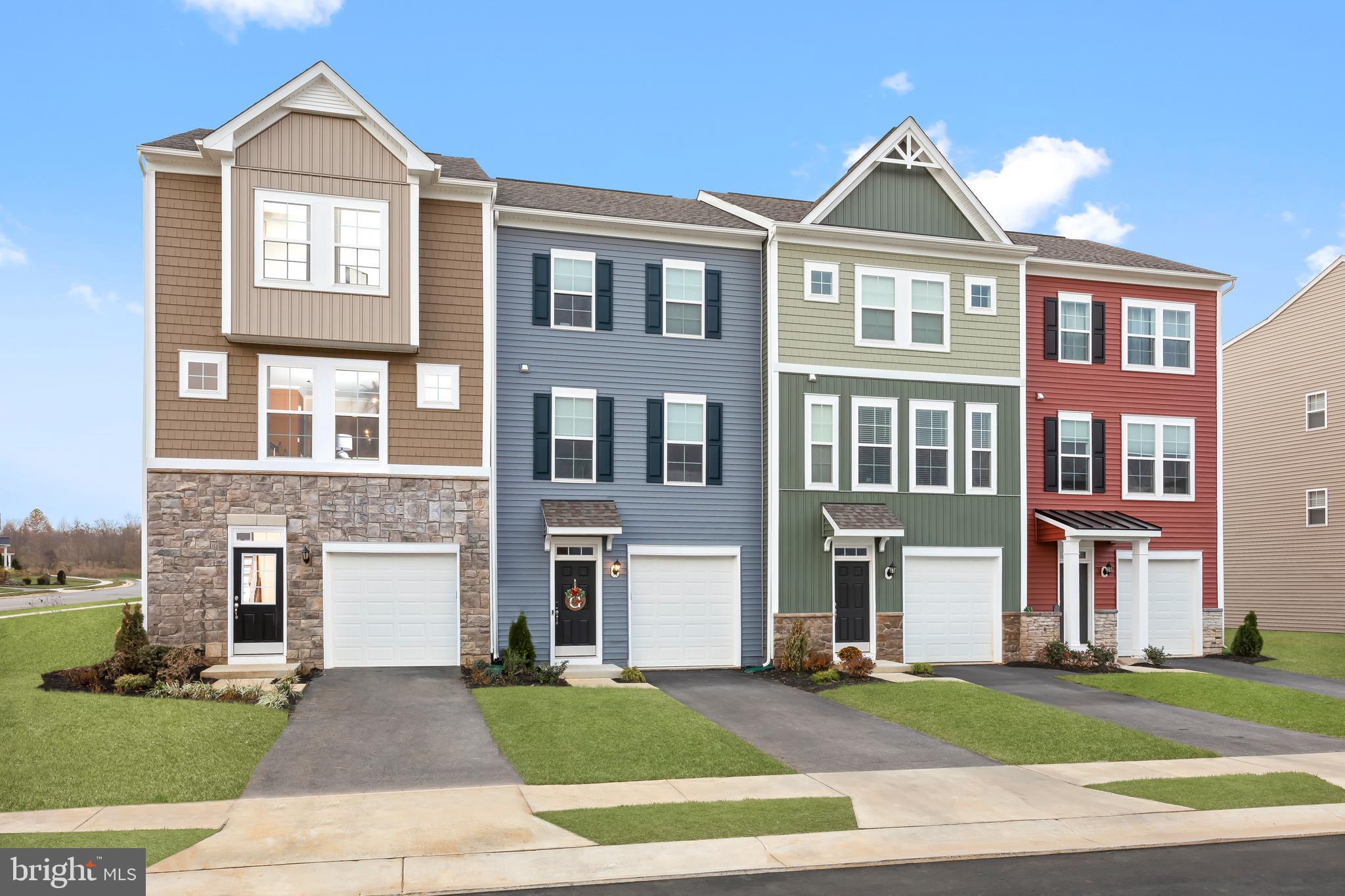 *OFFERING UP TO 15K IN CLOSING COST ASSISTANCE FOR PRIMARY RESIDENCE WITH USE OF PREFERRED LENDER AND TITLE.  CONTACT CO LISTING AGENT/CONSULTANT FOR DETAILS*  
Late Spring Delivery in Berkeley County’s premier planned community featuring a clubhouse, swimming pools, walking trails, lush landscaping and mountain views. This end unit ,Bedford II, 3 level townhome features a partial stone front with 1 car garage. This home features 3 Bedrooms and 3.5 Baths. It is fully finished top to bottom. The front door leads directly into the spacious lower level including 9 ft. ceilings, foyer with a double coat closet, access to the garage with a garage door opener. Continuing into the fully finished lower level recreation room with a full bath and walkout access to rear yard with privacy fencing. Open concept main level with 9 ft. ceilings, luxury vinyl plank flooring throughout this level, dining room and kitchen. The kitchen has stainless steel appliances, a large 8’ plus island, Mission style willow cabinets, Miami Vena quartz countertops, and a boxed bay window at the front. The kitchen leads directly into living room with powder room. The primary suite includes a large walk-in closet and the  primary bathroom has dual vanities with tiled shower with a seat. Laundry is located on the bedroom level. Home and community information, including pricing, included features, terms, conditions, availability and sales procedures related to appointments subject to change without notice. All images are for illustrative purposes only and individual homes, amenities, features, and views may differ. Images may be subject to copyright.