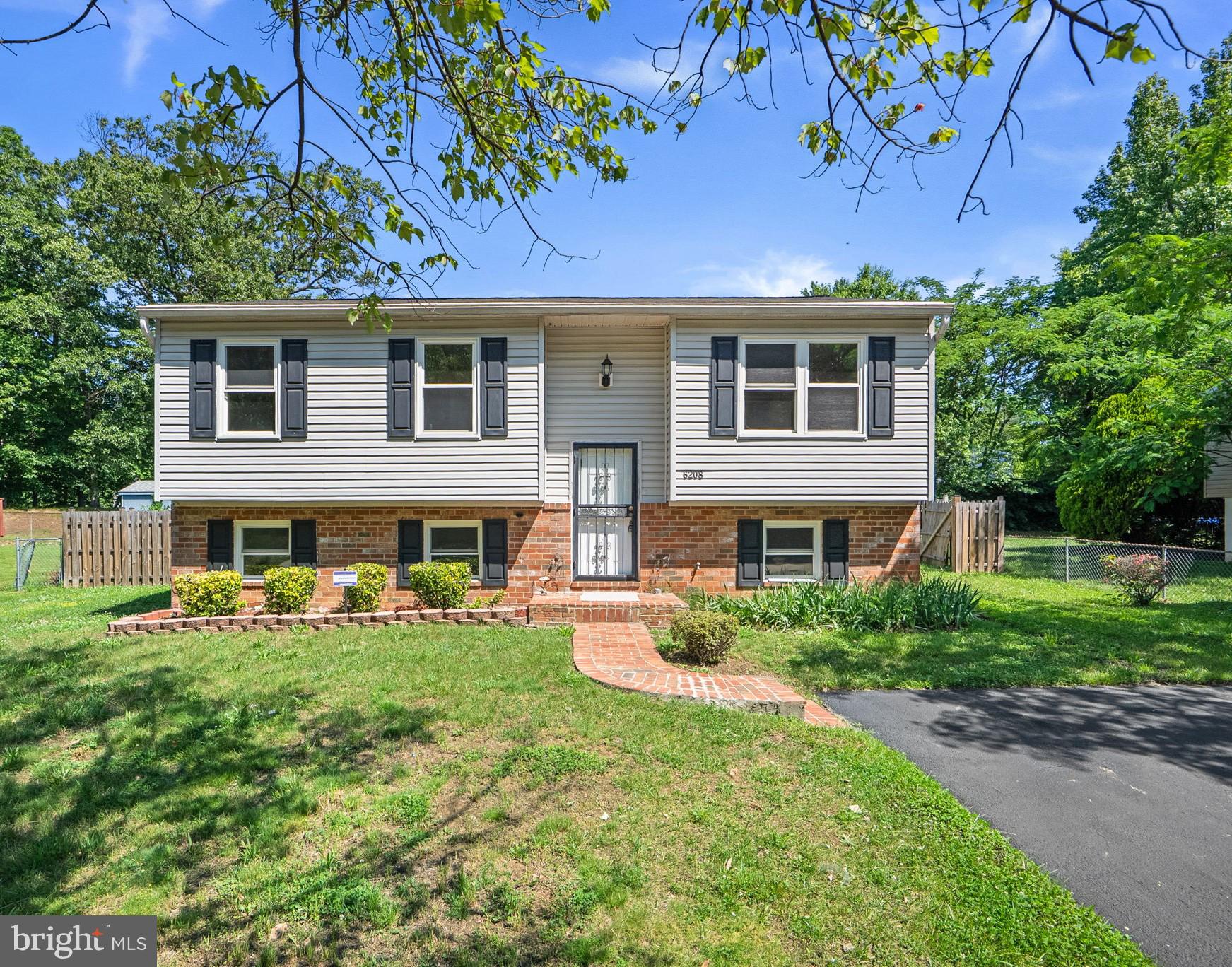 Fully Renovated and Move-In ready!! Nestled in a quiet community in Clinton MD, this gorgeous single family home features 5 bedrooms and 3 bathrooms. This spacious residence offers modern updates throughout, combining style, comfort, and functionality. Enjoy generous living spaces, updated finishes, and a thoughtfully designed layout ideal for families, guests, or a home office. The home also features two fireplaces, creating warm and inviting spaces for relaxing and entertaining. A large laundry room and dedicated storage area provide added convenience and practicality. Step outside to enjoy the outdoor deck overlooking the spacious yard—perfect for gatherings, outdoor dining, relaxation, and play. A wonderful opportunity to own a beautifully refreshed home that's ready for immediate occupancy.
