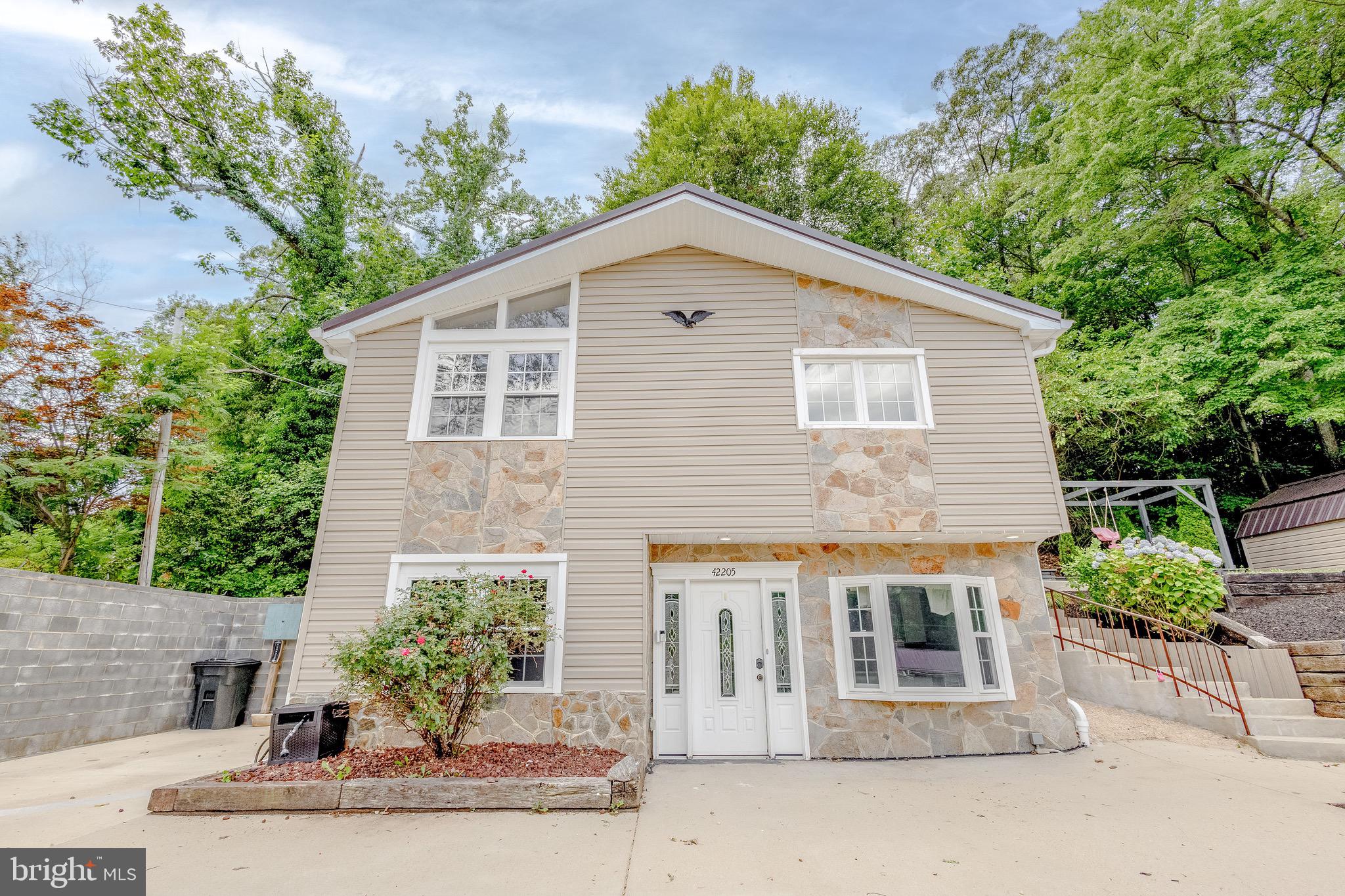 Welcome to 42205 Ridge Road in Mechanicsville, a move-in ready Colonial located in the established St. Mary's Beach community.

Renovated in 2018, this 4 bedroom, 3 full bathroom home offers a comfortable and functional layout. The main level features a welcoming foyer, kitchen and dining area, breakfast nook, crown molding, and a full bathroom. Upstairs, you'll find all four bedrooms, including the primary suite with its own private bath.

Outside, the home is perfectly positioned on the property, creating a sense of privacy and providing plenty of space between neighboring homes. Enjoy the circular paved driveway, patio, porch, mature landscaping, and storage shed.

Located just minutes from Snow Hill Park and Beach, you'll have easy access to kayaking, fishing, picnicking, and waterfront recreation while still enjoying the peaceful setting of home.

Whether you're looking for your first home, your next chapter, or simply a place to enjoy everything Southern Maryland has to offer, this well-maintained home is ready for its next owner.