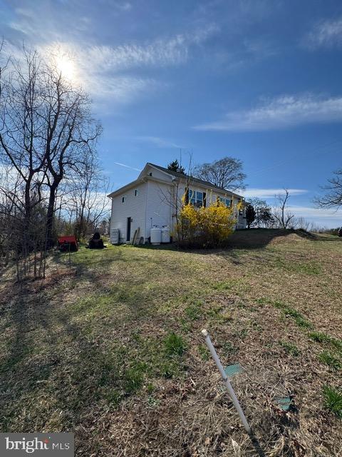 Rare opportunity to own 9.51 acres on Mountain View Rd in Stafford. This property features a 1950's bungalow with original character, including hardwood floors, walk-up attic, and unfinished basement.

Home is in need of renovation and is being sold as-is. Ideal for buyers looking to restore, renovate, or explore expansion possibilities (buyer to verify all zoning, land use, and subdivision potential with Stafford County).

Recent updates include replacement windows, updated siding, vinyl rails, high-efficiency furnace (2023), newer water heater, and roof approximately 11 years old. Property is served by county water and has an existing septic system that has been recently pumped.

Large acreage offers privacy and flexibility for a variety of potential uses. County plat available online. Property is currently occupied—appointment required.