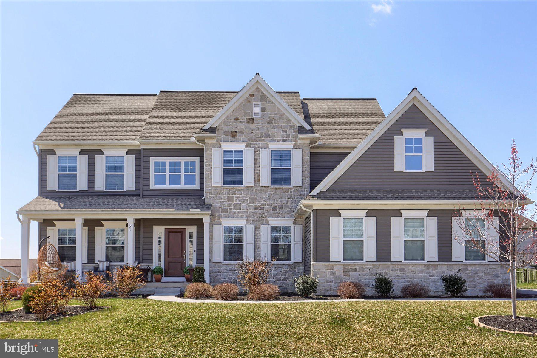 Nestled in the highly sought-after Meadowbrook Farms community and within the prestigious Cumberland Valley School District, this elegant two-story home offers 3,800 square feet of beautifully finished living space, complete with a 3-car side-entry garage.
Step inside to a dramatic two-story foyer, where rich wood plank flooring flows seamlessly throughout the main living areas. The heart of the home is an expansive white kitchen featuring solid surface countertops, a stylish tile backsplash, and a spacious dining area that opens to a sun-filled great room centered around a cozy gas fireplace—perfect for gatherings and everyday living.
The main level also offers a formal dining room ideal for entertaining and a private home office with classic French doors, providing a quiet retreat for work or study.
Upstairs, the luxurious primary suite serves as your private sanctuary with a relaxing ensuite bath showcasing a double vanity, walk-in tile shower, garden tub, and a generous walk-in closet. Three additional bedrooms—each with walk-in closets—share a full bath, and a convenient second-floor laundry room adds everyday ease.
The finished lower level provides even more versatility with a potential 5th bedroom or additional office, a spacious entertainment area, and a separate game room—plenty of room to relax, play, or host guests.
Step outside to the rear deck overlooking a manicured, level lawn—ideal for outdoor enjoyment with ample space for play, gatherings, or even a future pool.
This home blends timeless style with exceptional space and a prime location—don’t miss your opportunity to make it yours!