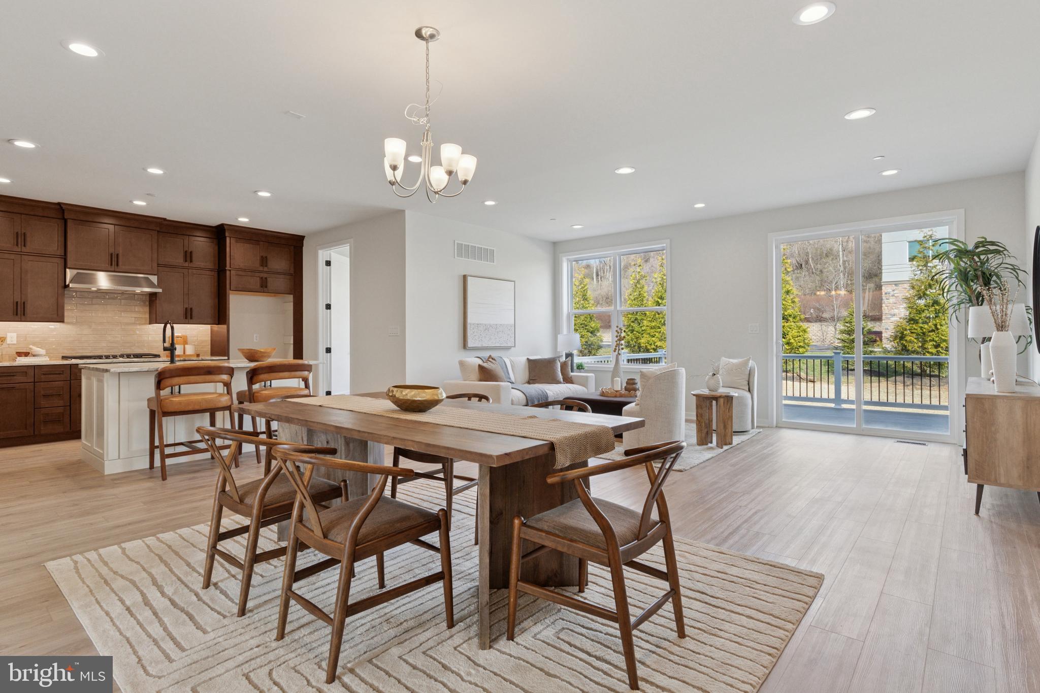 The Noble home design offers flexibility and comfort within an open-concept floor plan. A stunning foyer welcomes you into the home, leading into the expansive great room, casual dining area, and adjacent flex room. Overlooking the main living space is the well-designed kitchen, enhanced by a walk-in pantry, large center island, and ample counter and cabinet space. The elegant primary bedroom suite is tucked away on the second floor, featuring a sizable walk-in closet and spa-like primary bath that offers dual sinks, a large shower, and private water closet. The second floor is enhanced by a spacious loft that provides additional living space and is central to the secondary bedrooms as well as a hall bath. The Noble is also highlighted by easily accessible second-floor laundry, a powder room, and plenty of additional storage.
The Designer Appointed Features are included and this home is move in ready!