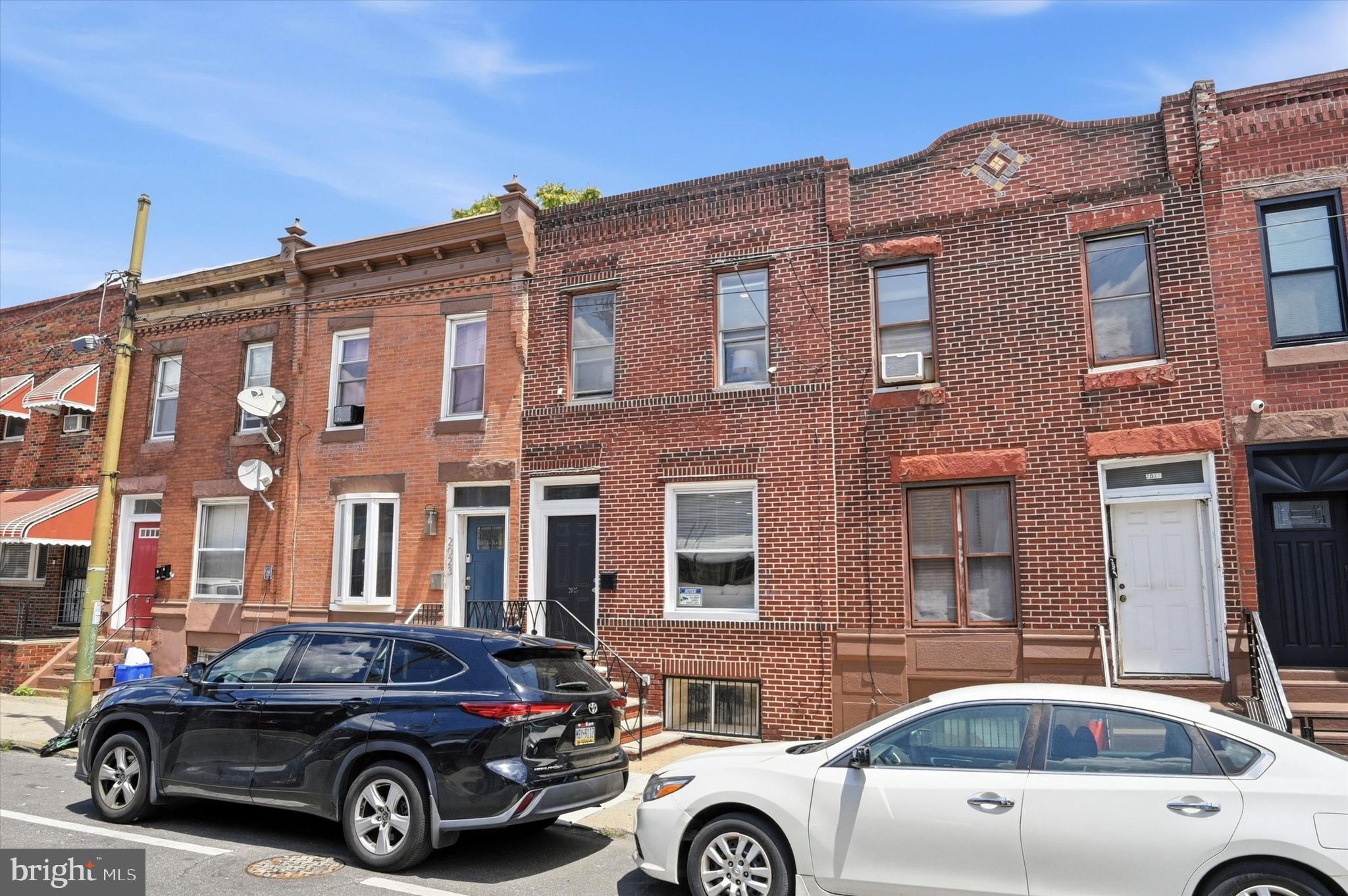 Welcome to 2025 S. 22nd St., a stunning property nestled in the heart of one of Philadelphia's most vibrant neighborhoods. This charming home boasts a classic brick façade and brand new windows, offering both curb appeal and energy efficiency. Step inside to a beautifully designed interior featuring lightly gray walls that create a bright and inviting atmosphere, complemented by an abundance of natural sunlight pouring in through large windows.

As you enter, you'll appreciate the exquisite wood and iron railing that adds a touch of elegance to the space. The recessed lighting throughout enhances the modern feel, making this home perfect for entertaining or relaxing with family. The spacious kitchen is a chef's dream, equipped with stainless steel appliances, including a beautiful stove with a stylish hood, perfect for creating culinary masterpieces.

Convenience is key with easy access to a washer and dryer on the first floor, alongside a half bath, making daily routines effortless. The home features stunning natural wood flooring, providing warmth and charm throughout the living spaces.

With three spacious bedrooms and two and a half baths, including an accessible shower, this home offers plenty of space for family and guests. The finished basement adds additional living space, ideal for a home gym, entertainment area, or office.

Located in a popular area, you'll find yourself just steps away from local shops, trendy cafes, and vibrant community parks. Enjoy easy access to public transportation, connecting you to the heart of Philadelphia's cultural attractions, dining, and entertainment options.

Don't miss the opportunity to make this beautiful property your new home, where modern convenience meets classic charm in a thriving neighborhood!