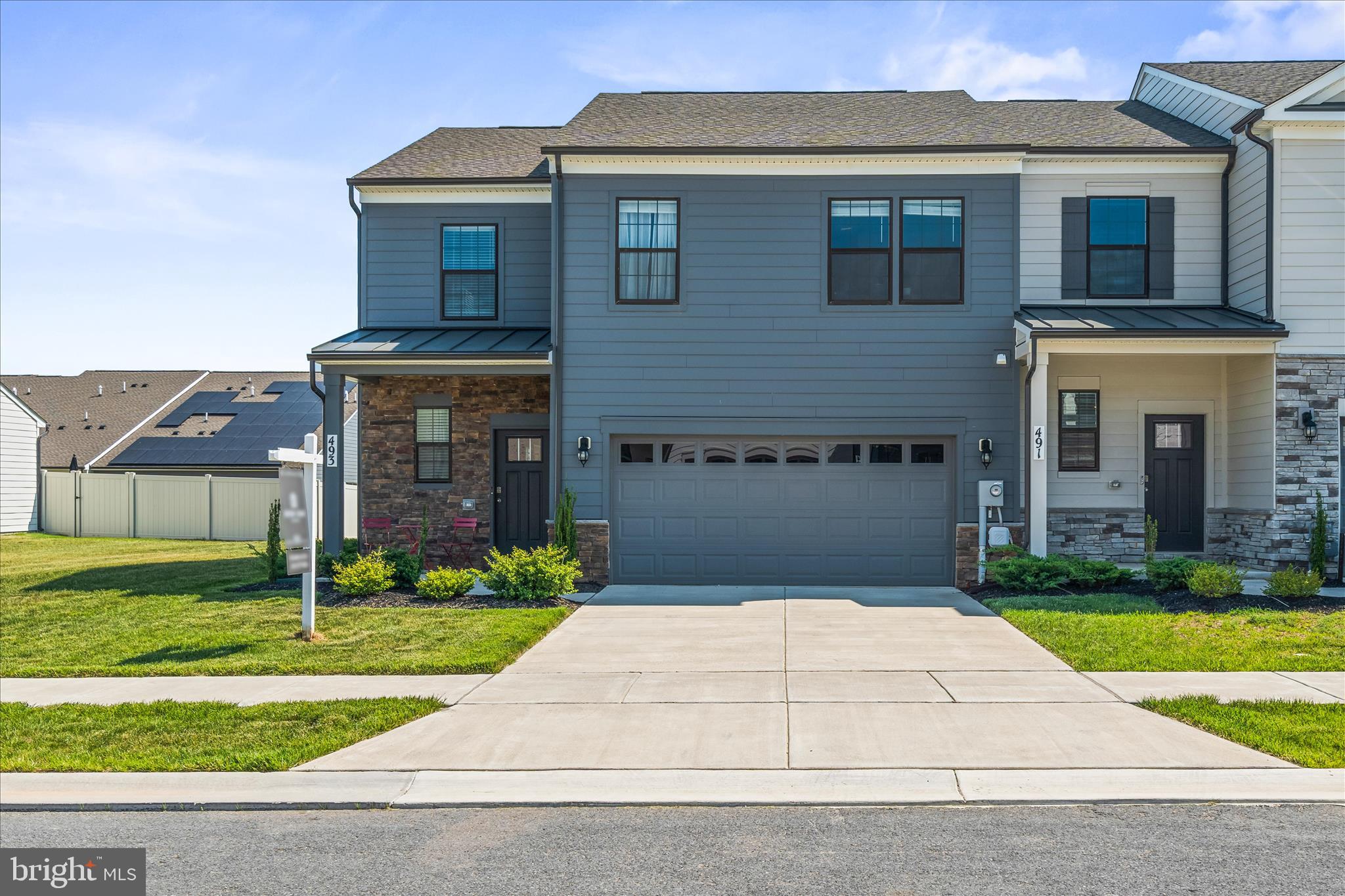 Rarely Available and Sought after Main Level Living in Renn Quarter.  Welcome to 493 Hanson Street, a beautifully upgraded end unit villa in one of Frederick’s most desirable communities. This thoughtfully designed home offers the perfect blend of style, convenience, and low maintenance living with designer finishes throughout, a spacious and functional layout, and an abundance of natural light thanks to its premium end unit placement and additional windows. One of the standout features is the main level primary suite, creating easy everyday living without sacrificing space. Outside, enjoy a fully fenced and beautifully manicured yard, perfect for relaxing evenings, entertaining, or giving pets and little ones room to play. Located in Renn Quarter, you are just moments from commuter routes while still being able to enjoy the walkability and lifestyle that Downtown Frederick is known for including restaurants, coffee shops, boutiques, breweries, and community events. End unit. Larger lot. Designer touches. Main level living. Downtown convenience. This one is special and you are not going to want to miss it!