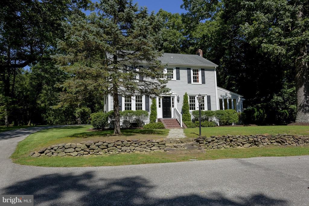 Stunning 3 BR, 2 BA home offers 42" cherry cabinets, granite counters, s/s appl, & ceramic tile. Renovations include: newer windows, baths, doors, vinyl siding, HVAC, water heater, well pump, septic system... Bonuses: 1.19 acre lot, sunroom, refinished hdwds, french doors, crown molding, recessed lights, full bsmnt, FPL, deck, 2 car garage, parking pad, shed, & a circular driveway. No HOA fees!