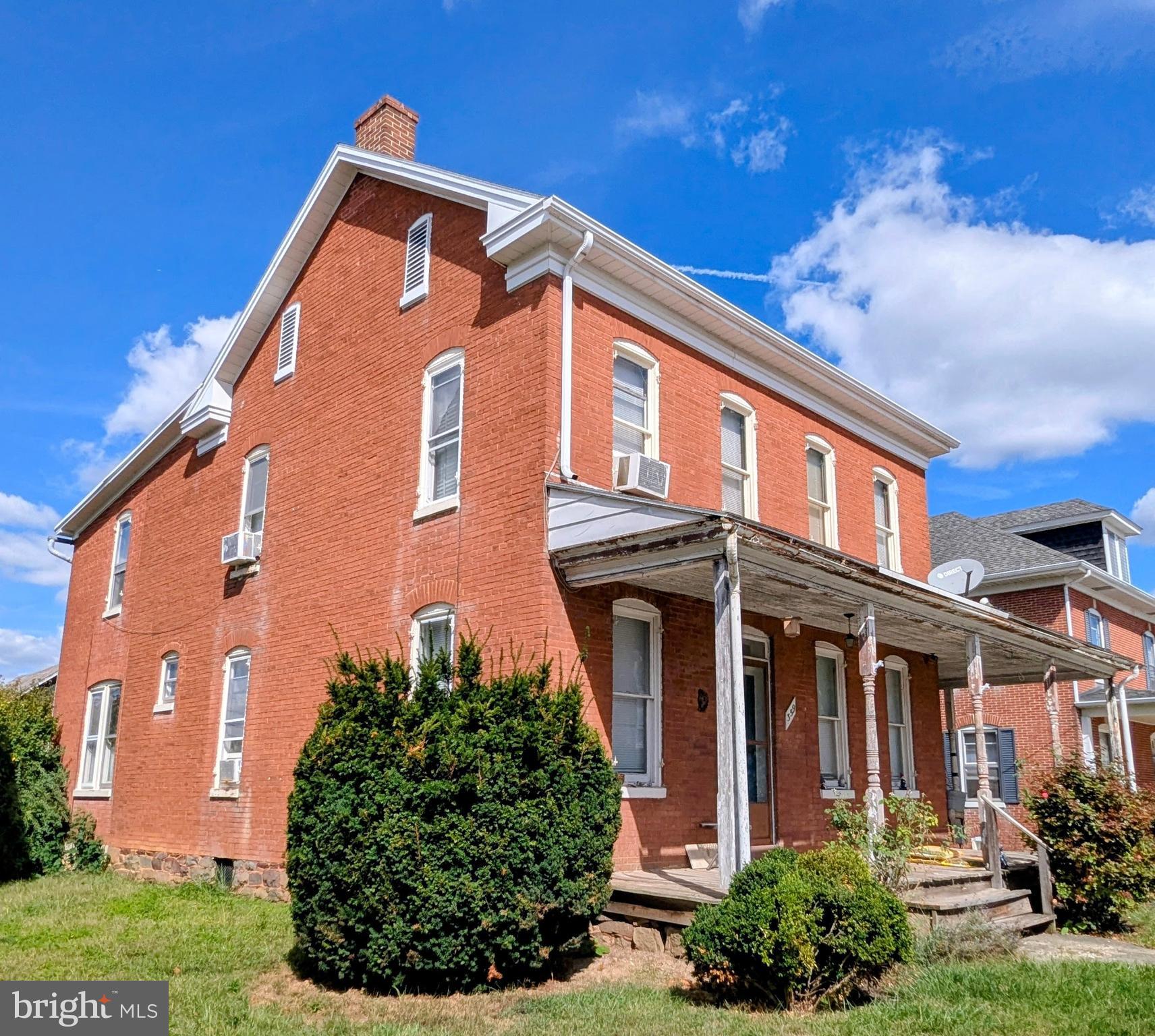 Make this  home your dream home! Offering over 2,500 square feet, five bedrooms, and three full baths, this charming brick Victorian is filled with character and possibilities. Built in the early 1900s, the spacious floor plan features soaring ceilings and provides the perfect canvas for your imagination and creativity.

Dual staircases lead to the upper level, where you’ll find five generously sized bedrooms and two full baths. Situated on a large lot with an oversized three-car garage, this property could continue as an impressive single-family home or potentially be transformed into a multi-family investment opportunity. Bring your vision and restore this timeless home to its full potential!