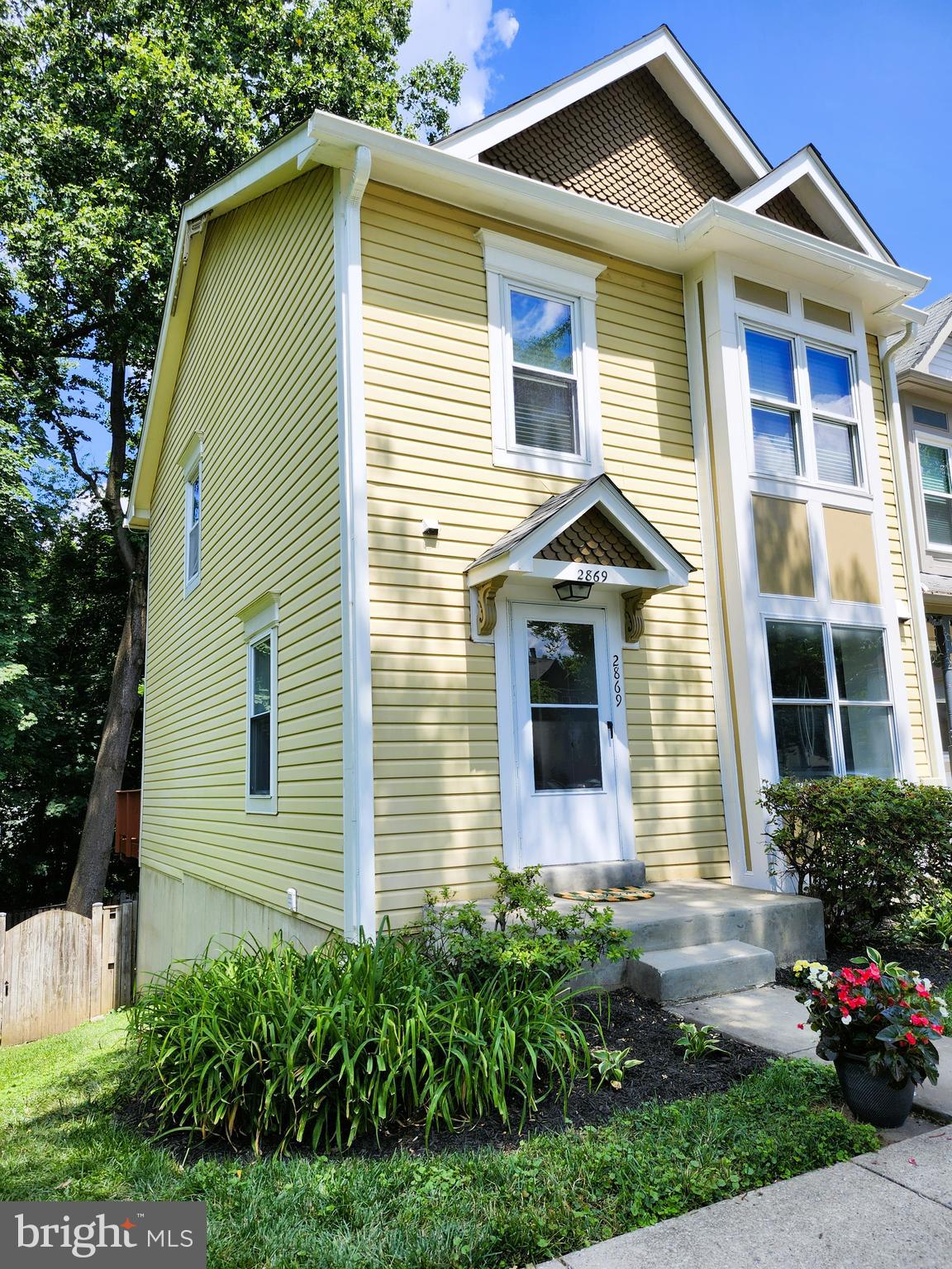 Refreshed, Renovated and Ready to be your new home.   
Move-in ready end - unit townhouse in desirable community walkable to everything from the Red Line Metro and shopping to eclectic restaurants and Beach Drive.  Much in-demand location for families and singles alike; Rockview Elementary School bus pick-up in the community, short walk to Newport Middle School and Albert Einstein High School (an International Baccalaureate  --  IB designated school).  Enjoy Pleasant View Park right outside the front door as well as the track and field for walking and running.  Historic downtown Kensington/Antique Row only a 5-minute drive or walkable.     
3 bedrooms,  3.5 bathrooms, Master Bedroom with vaulted ceiling, finished lower level entertainment room (possible 4th bedroom)  with new carpet, ample storage space,  large deck backing to woods with steps leading to a fenced back yard, new roof, new attic insulation, new gutters, new front storm door, freshly painted in neutral tone, stainless steel appliances, including a new over the stove microwave, custom built breakfast bar, and Andersen gliding doors on main + lower levels,   You will also enjoy reserved parking right outside the front door.
HOA fee covers grass cutting front, side and backyard as well as maintenance of common areas, and snow removal.