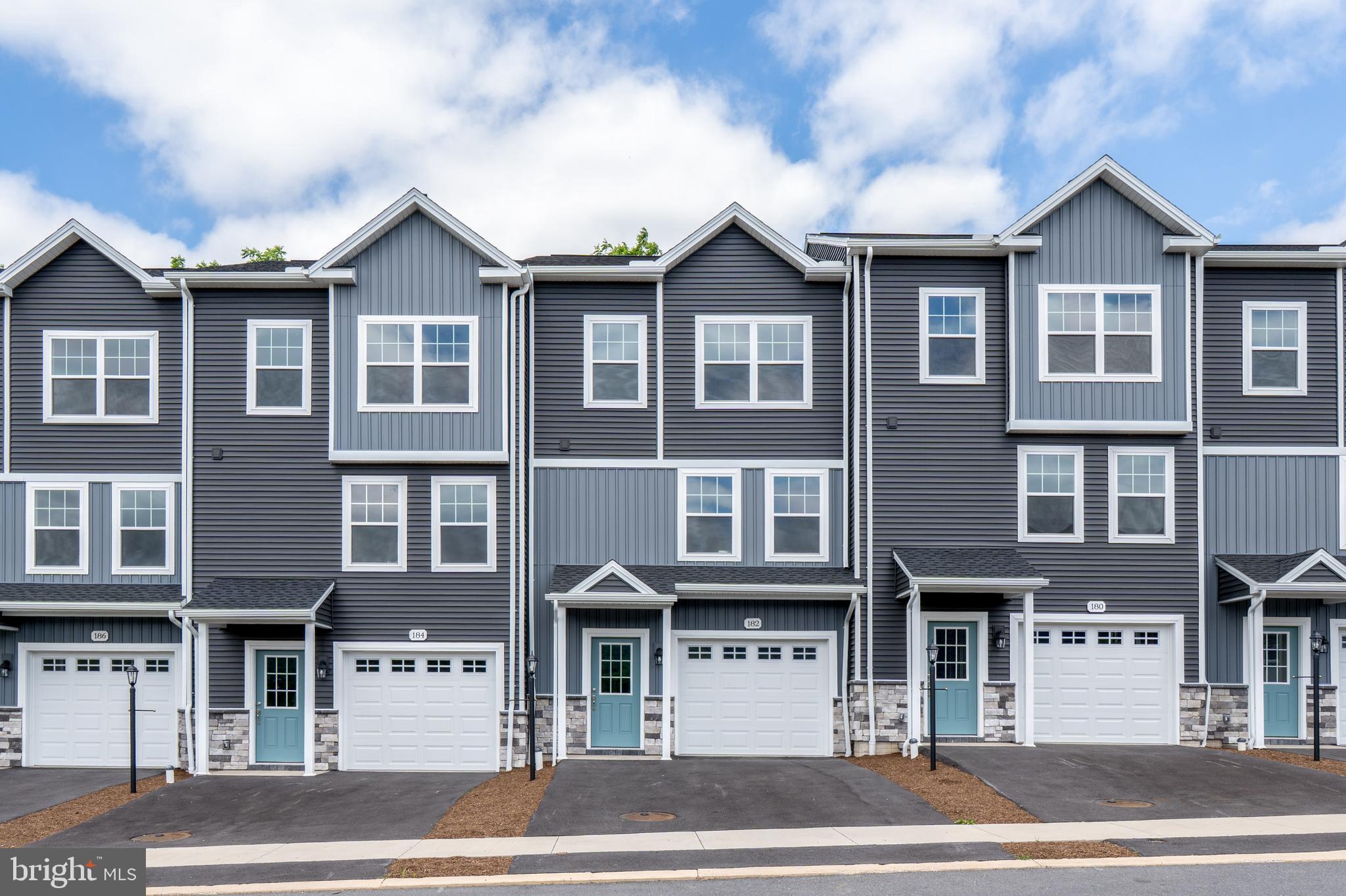 Steeplechase offers a suburban setting with walking paths and landscaped common areas, located 5 minutes from I-99, near Historic Bellefonte, and 10–15 minutes from Penn State University. 

The Redfield townhome plan features a kitchen with quartz countertops, upgraded cabinetry, a center island with overhang, and Whirlpool appliances, including a smooth top range, microwave, and dishwasher. Wafer LED lighting is included throughout. A 10' x 10' pressure-treated deck provides outdoor space. The owner’s suite includes a private bath, and second-floor laundry adds convenience. The home also includes an unfinished basement, a garage door opener, and central air.

Contact us for more details on this home.