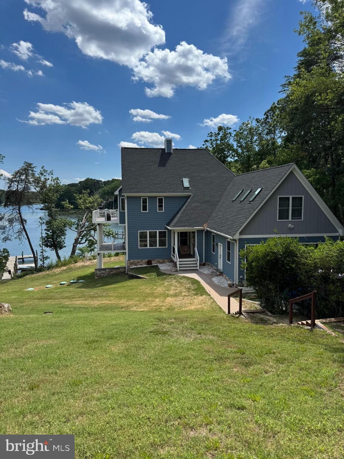Experience waterfront living on Mill Creek with private water access and a private pier offering direct access to the Chesapeake Bay. The home features an open living area filled with natural light, multiple gathering and recreational spaces, and beautiful water views throughout. Enjoy boating, fishing, kayaking and paddle-boarding from your own backyard, just minutes from Solomons Island's waterfront dining an entertainment.
