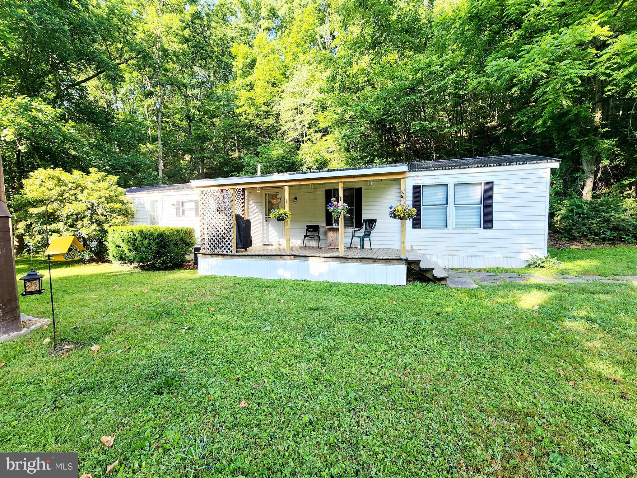 This adorable updated get-away could be yours or a great investment property for an airbnb! Less than 2 hours from Baltimore, approximately an hour to Deep Creek Lake & just over 2 hours to Pittsburgh. This 2 bedroom, 1 full bath  home has so much to offer. New roof, HVAC, plumbing, exterior doors, kitchen and bathroom updates. The kitchen counters are gleaming! The bathroom sink & light feature are so cute! Just a couple minutes off 68, so hop on the Interstate and visit the Rocky Gap Casino or State Park which is just minutes away.
