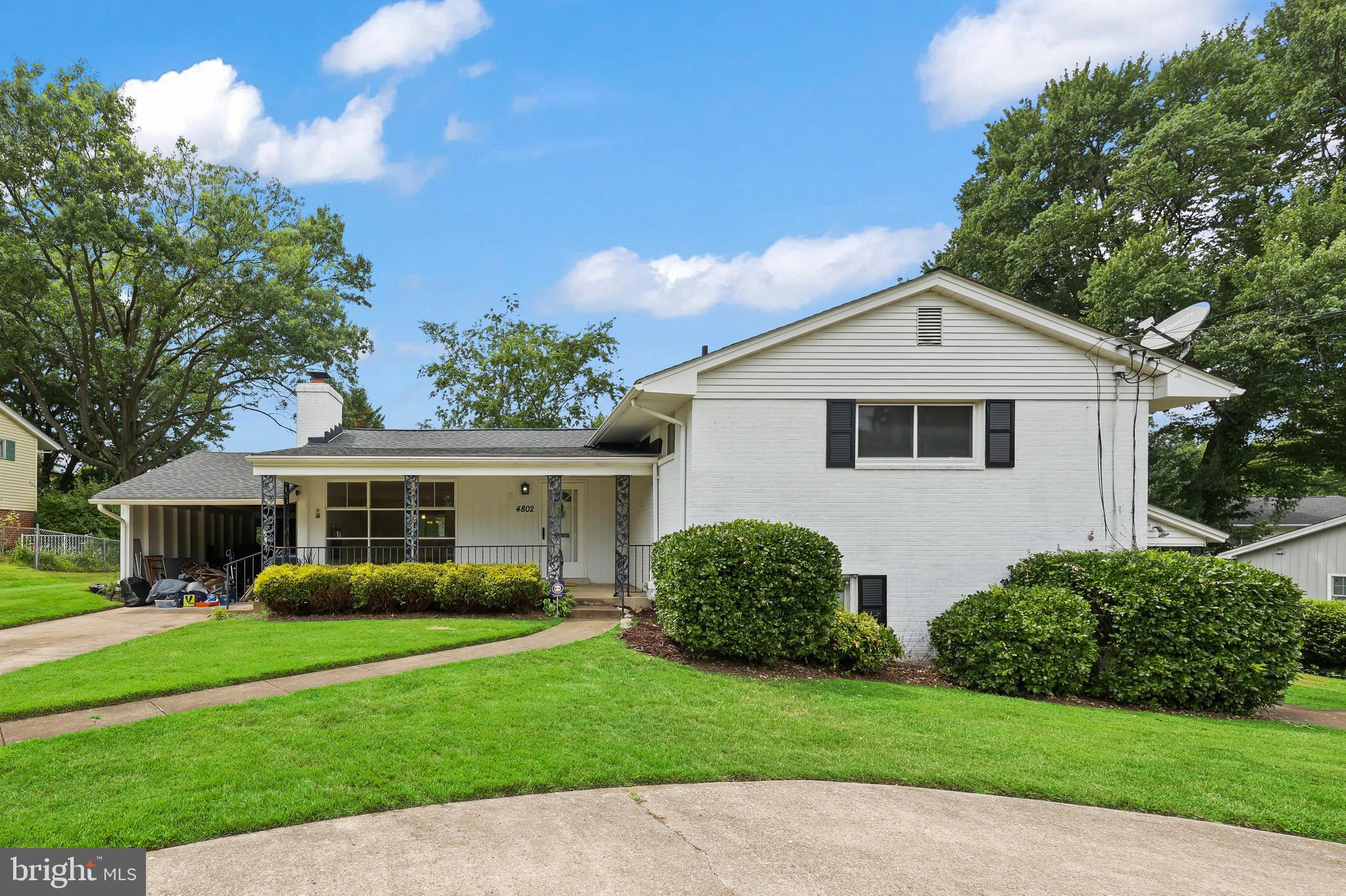 Spacious four-level home in the heart of Annandale offering exceptional flexibility for multi-generational living or investment potential. A large wraparound driveway provides ample parking for multiple vehicles, complemented by an extended carport.
Inside, enjoy hardwood floors throughout the main and upper levels, fresh paint throughout, and updated main bathrooms with new vanities and mirrors. The lower level features a full bedroom, full bathroom, and separate entrance—ideal for guests, extended family, or rental opportunities.

The unfinished fourth level offers endless possibilities for a rec room, home office, gym, or additional storage. Outside, the large fenced backyard provides plenty of space for entertaining, pets, and play. Conveniently located near major commuter routes, shopping, dining, and parks.